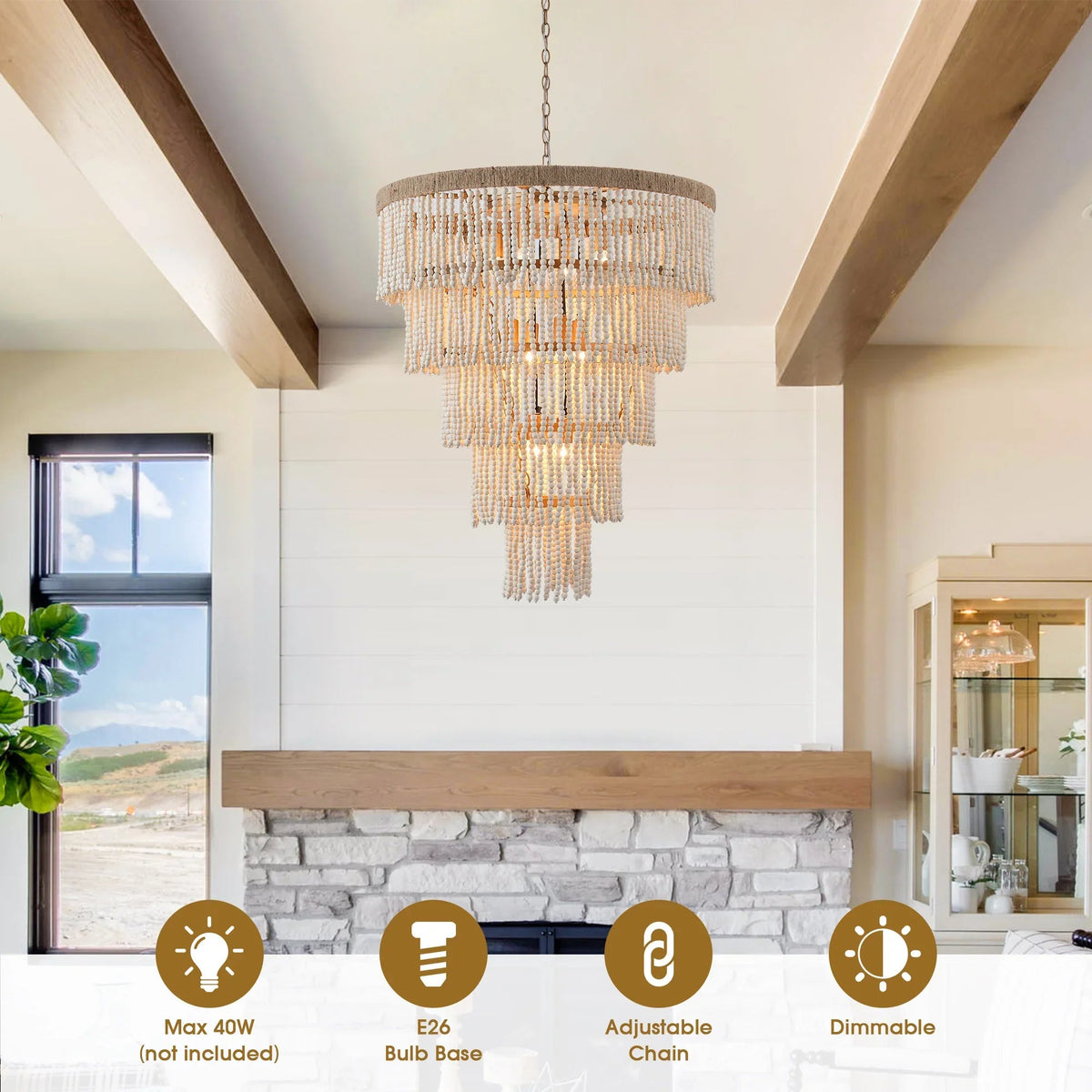 Golden beaded chandelier with cascading bead fringe and lit bulbs beneath drum shade