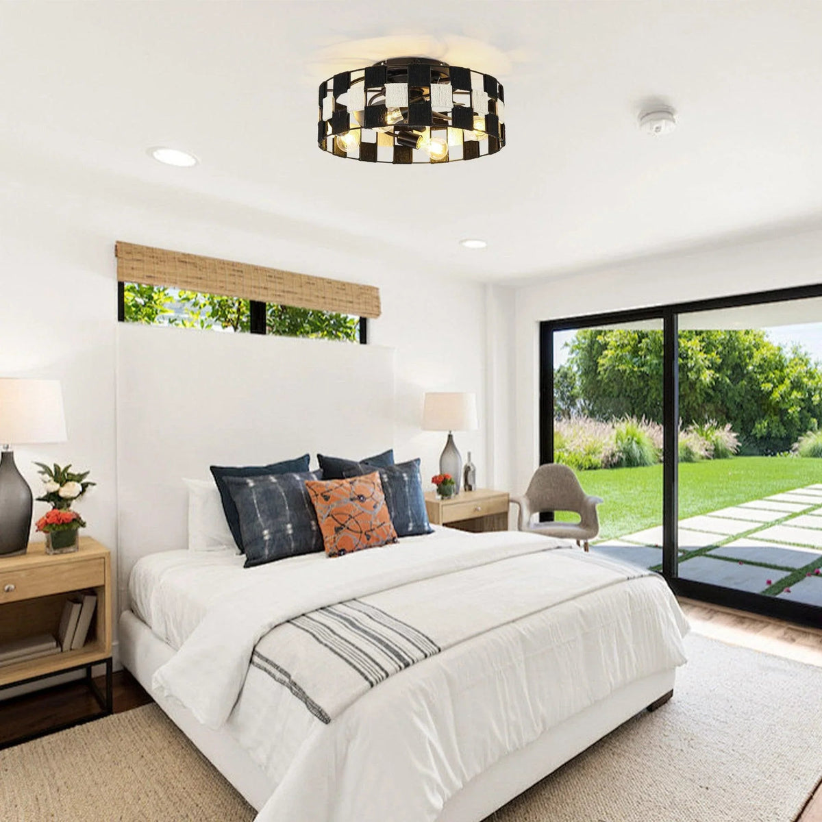 Black flush mount ceiling fan with light in a bedroom
