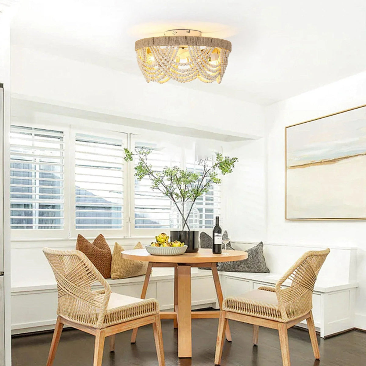 Flush-mount wood-bead ceiling fan with warm bulbs installed on a ceiling in a living room