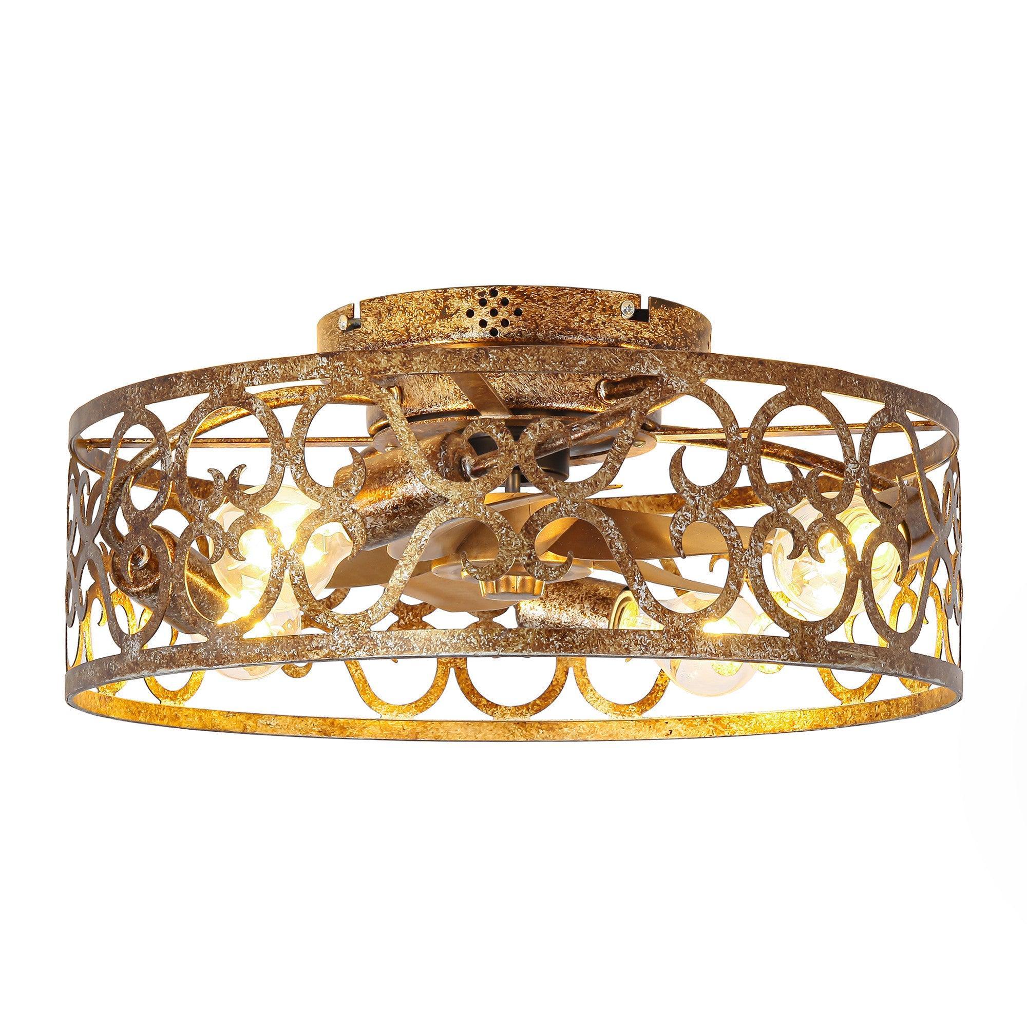 Golden distressed flush-mount ceiling fan light with ornate metal cage and lit bulbs