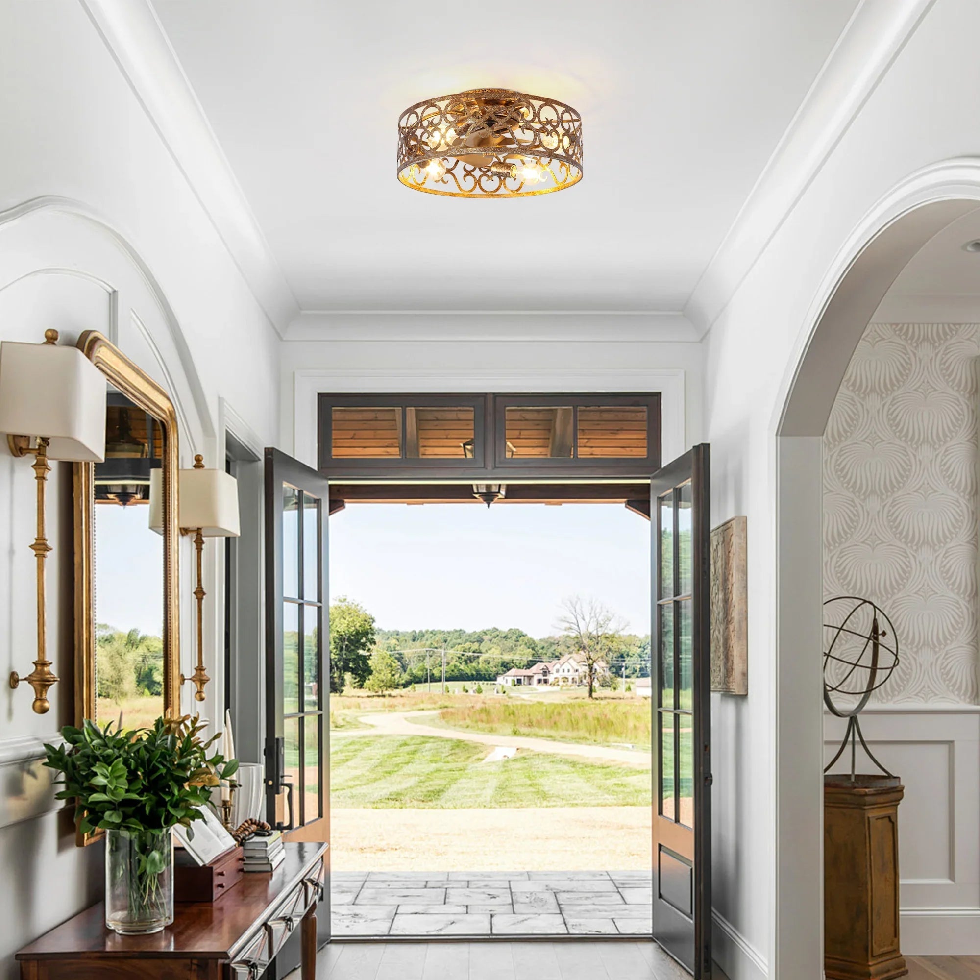 Golden flush-mount ceiling fan light with ornate metal filigree shade and integrated light