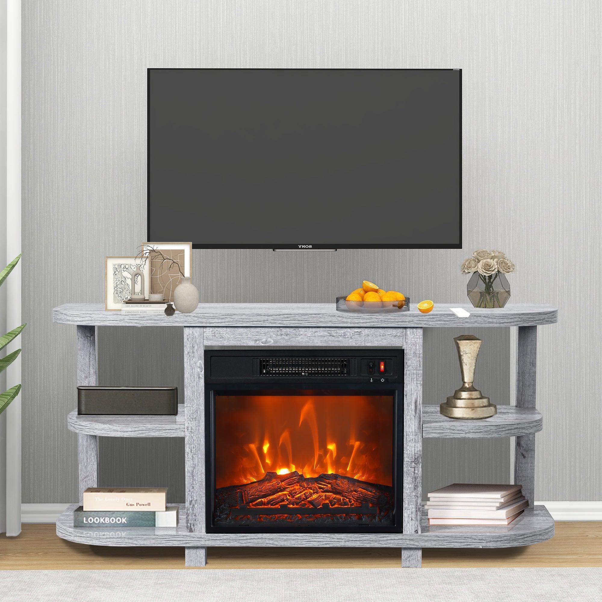 Grey TV stand with electric fireplace insert, media shelves, and wide top platform