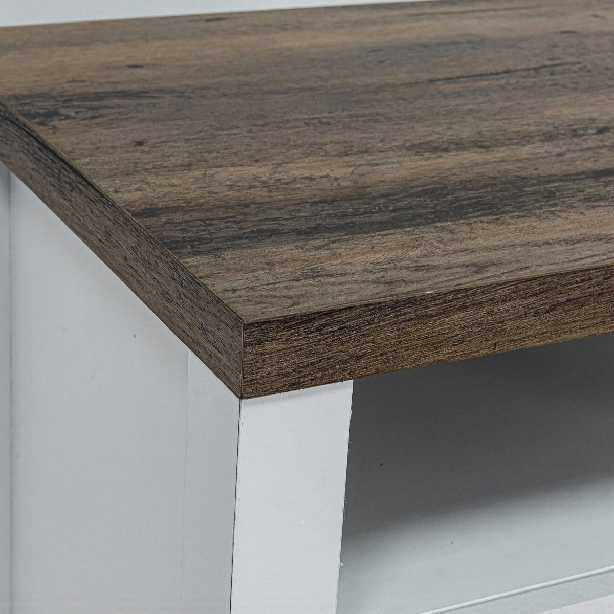 Brown solid wood nightstand top edge with distressed grain finish