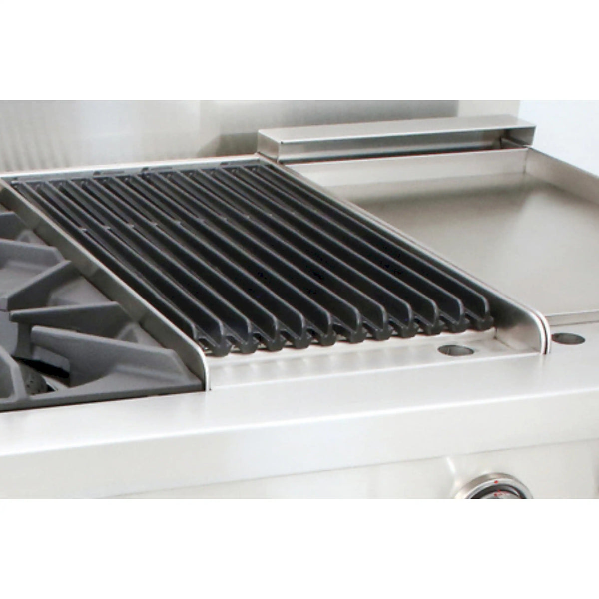 Stainless steel griddle with ridged surface and side grill grate on gas range