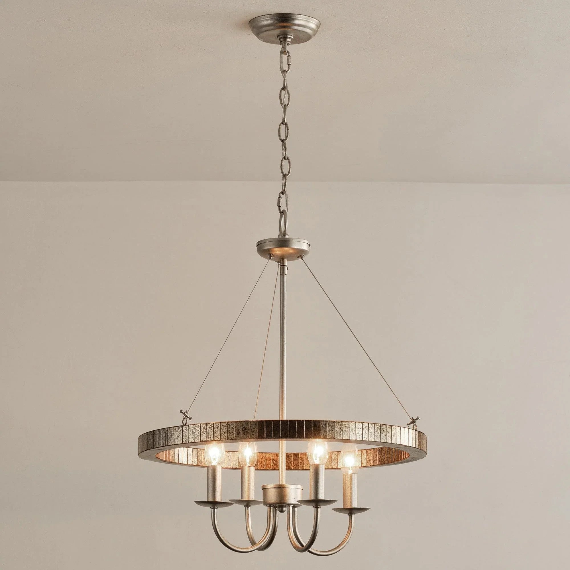 Smaller view of satin nickel 4-light island pendant with textured ring and glowing bulbs