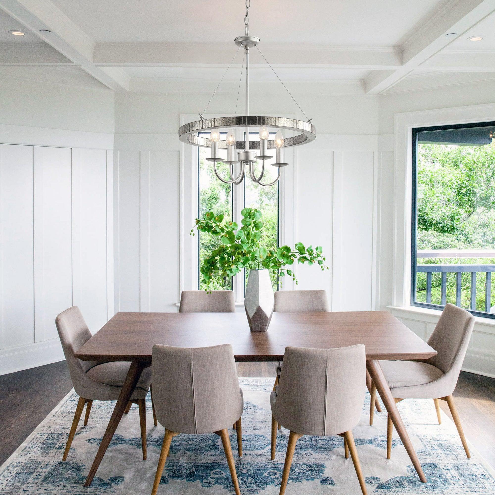 4-light island pendant with textured circular shade and four lit bulbs over dining table