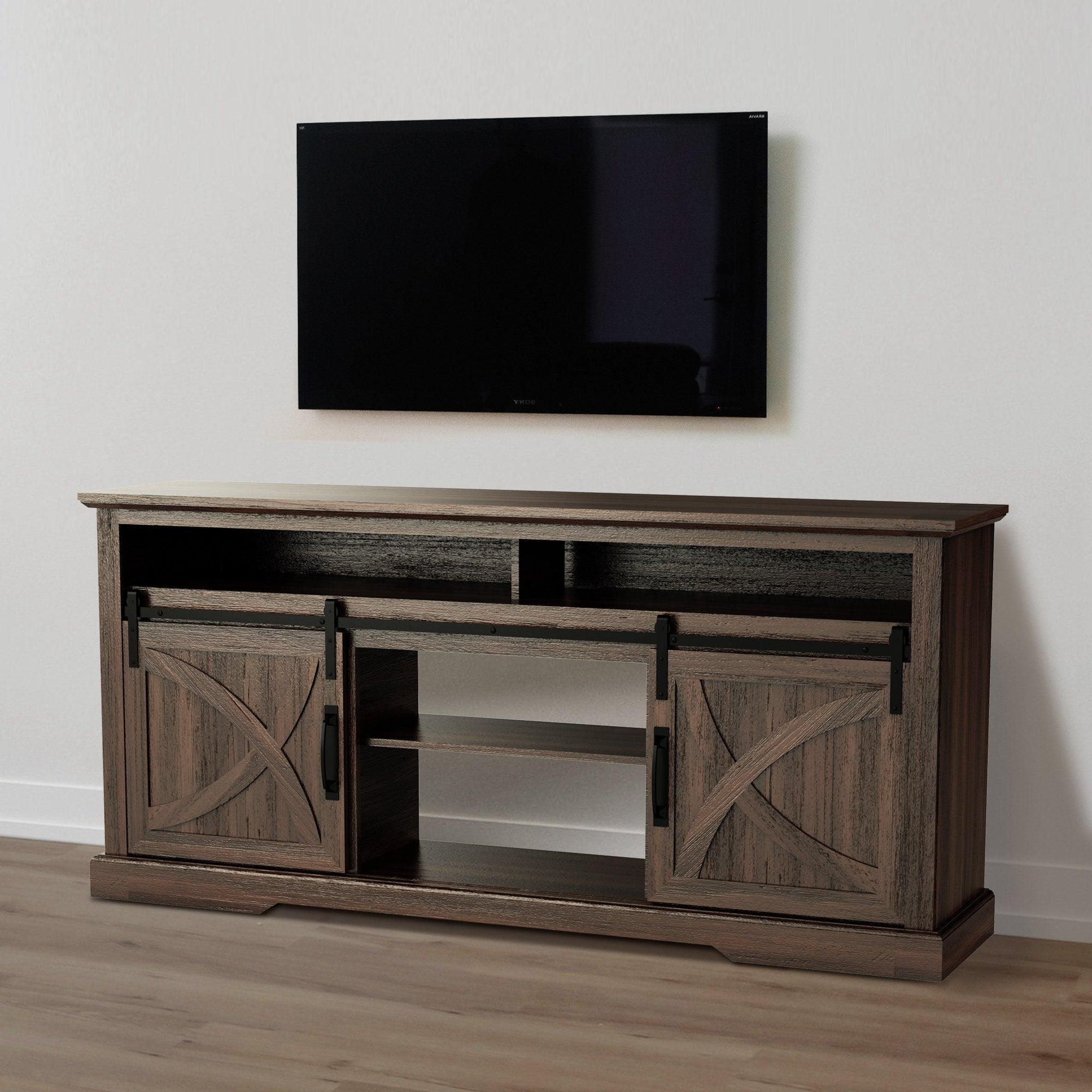 Brown wood farmhouse TV stand with double sliding barn doors and central open shelf