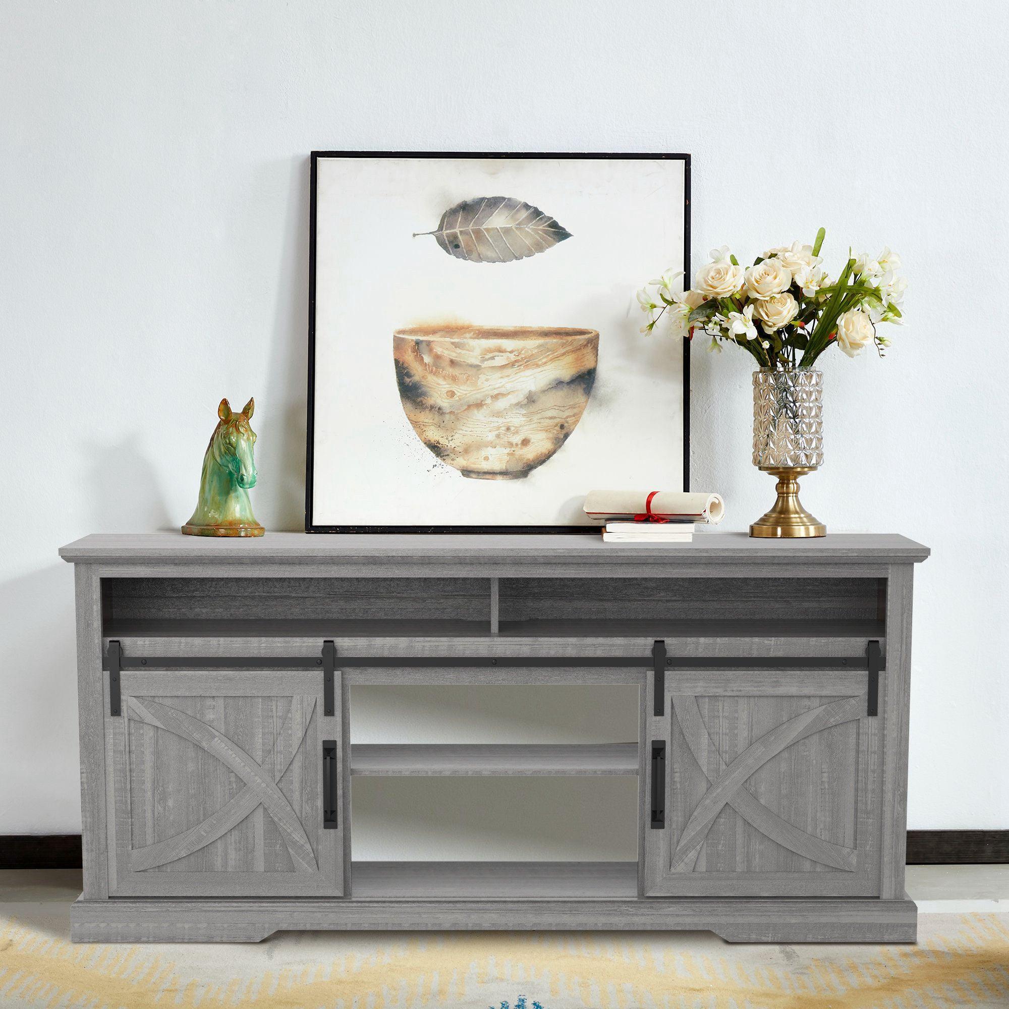 Grey farmhouse TV stand with double sliding barn doors and center open cubby