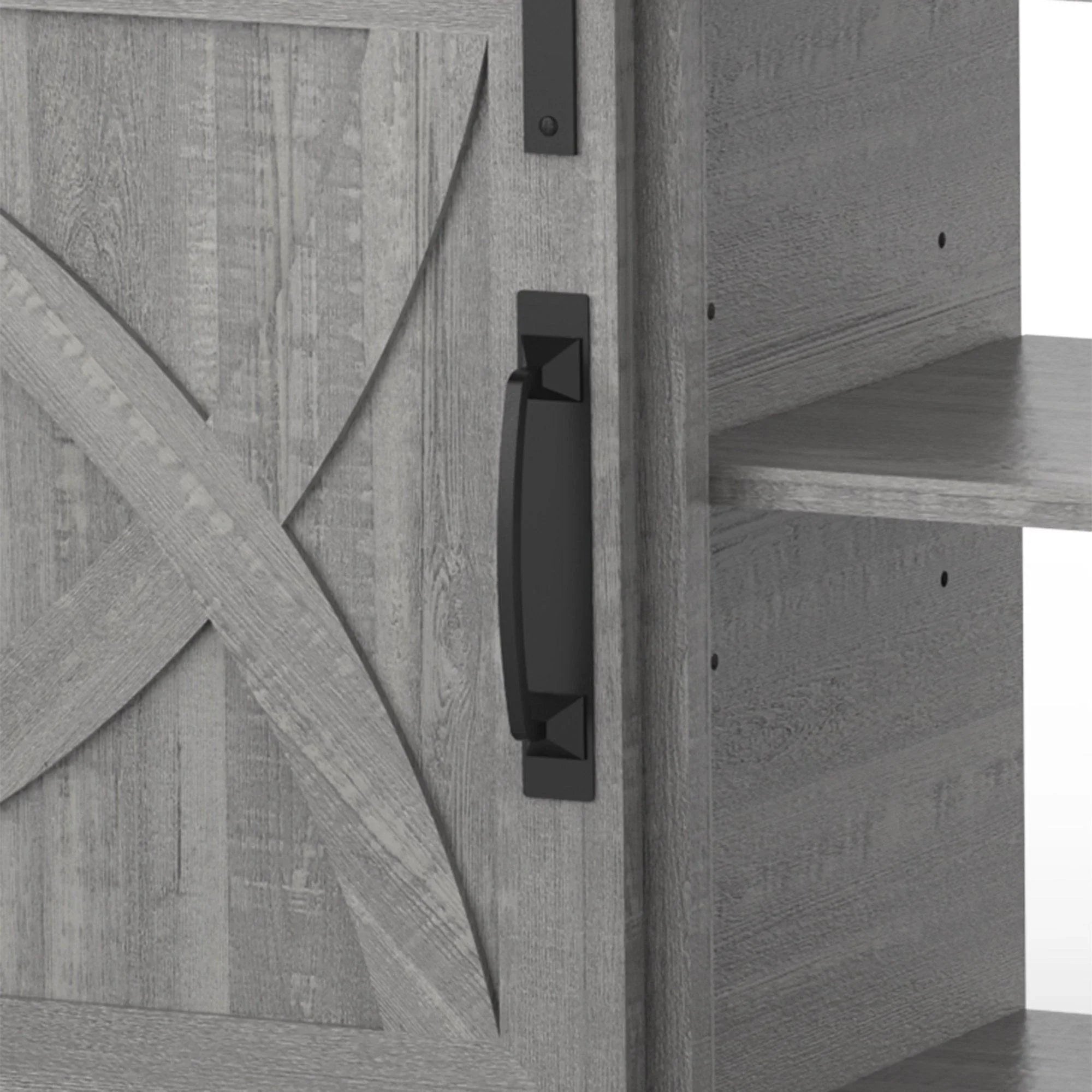 Grey barn door handle and hinge hardware on TV stand