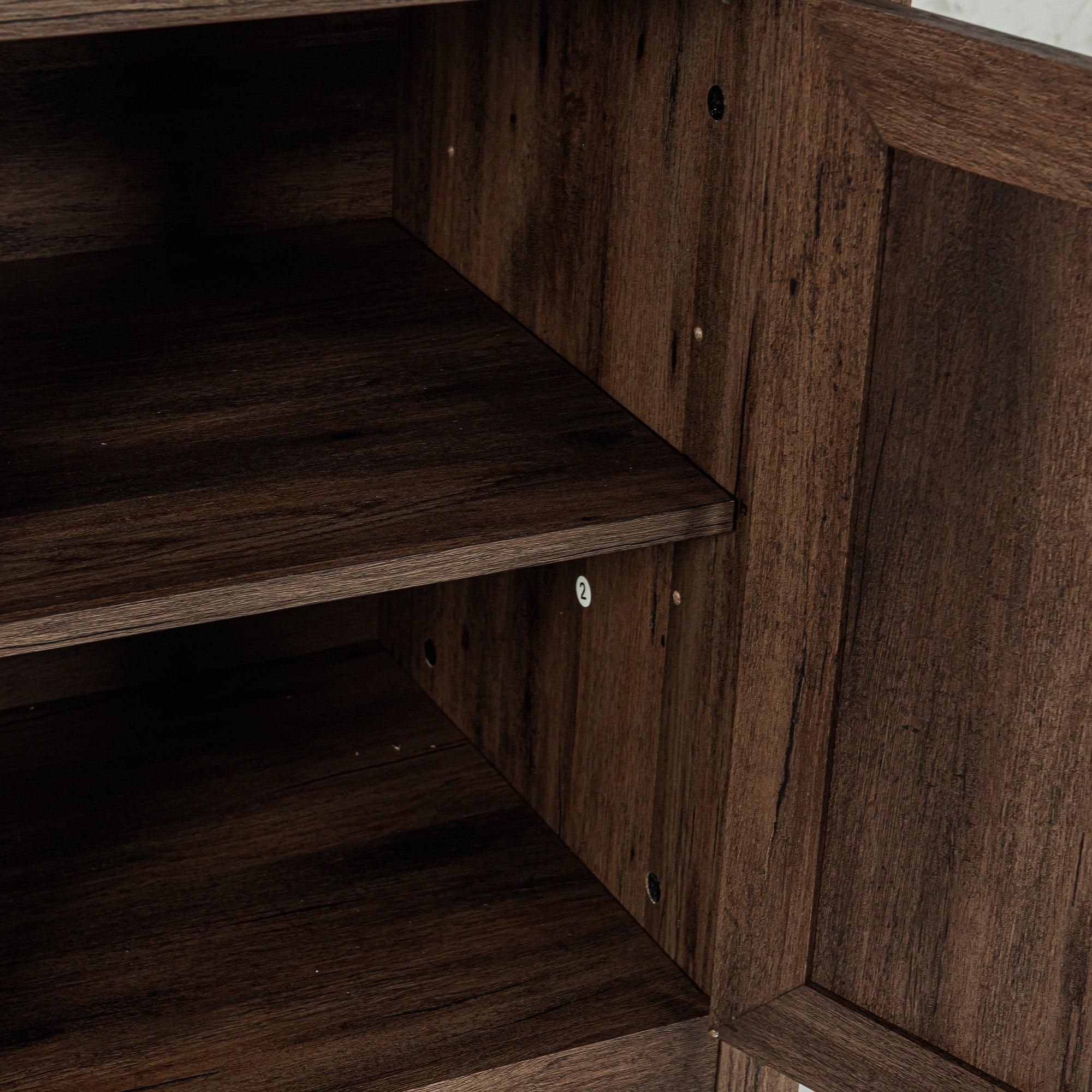 Inside corner of dark brown TV stand with shelving and panel detail