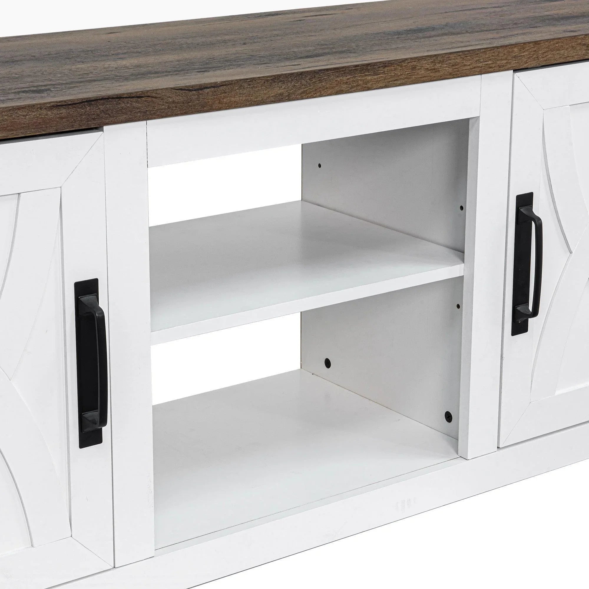 White TV stand cabinet with open shelves behind paneled doors and black bar handles