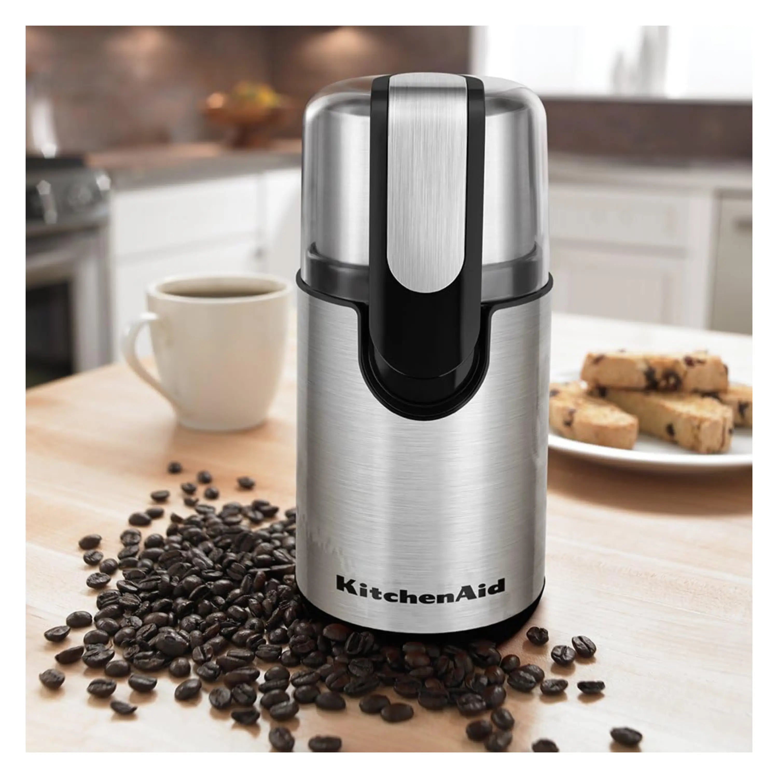 Stainless steel countertop coffee grinder with onyx black top and KitchenAid logo