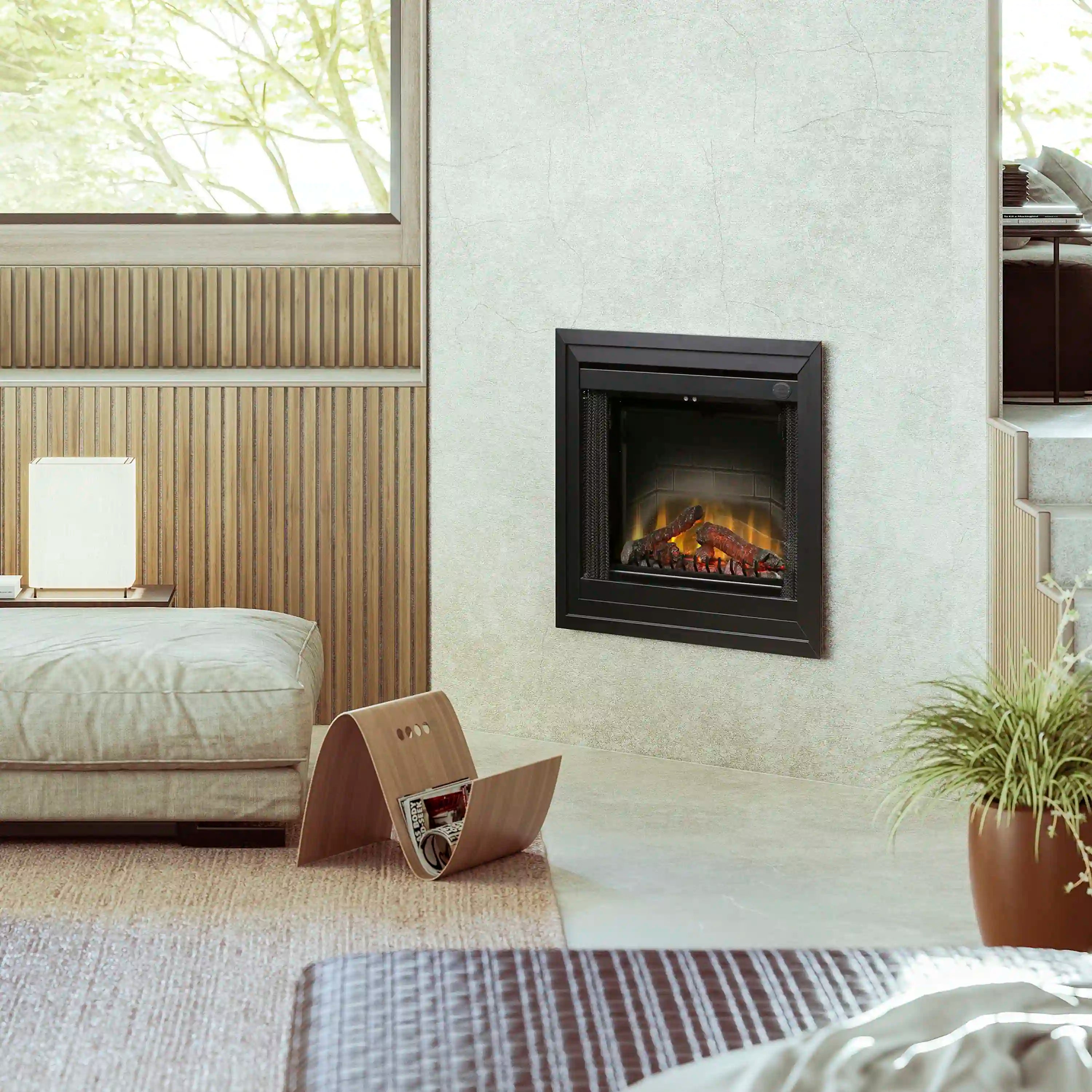 Built-in electric fireplace with black surround and glowing log flame display