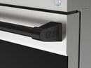 Stainless gas range control panel corner with black trim handle and GR logo