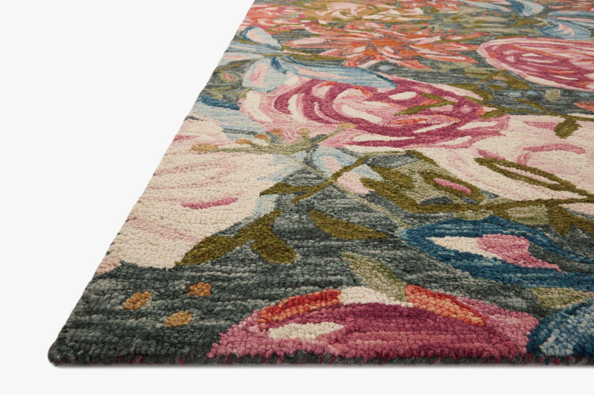 Multicolor floral accent rug with textured pile and dark border corner
