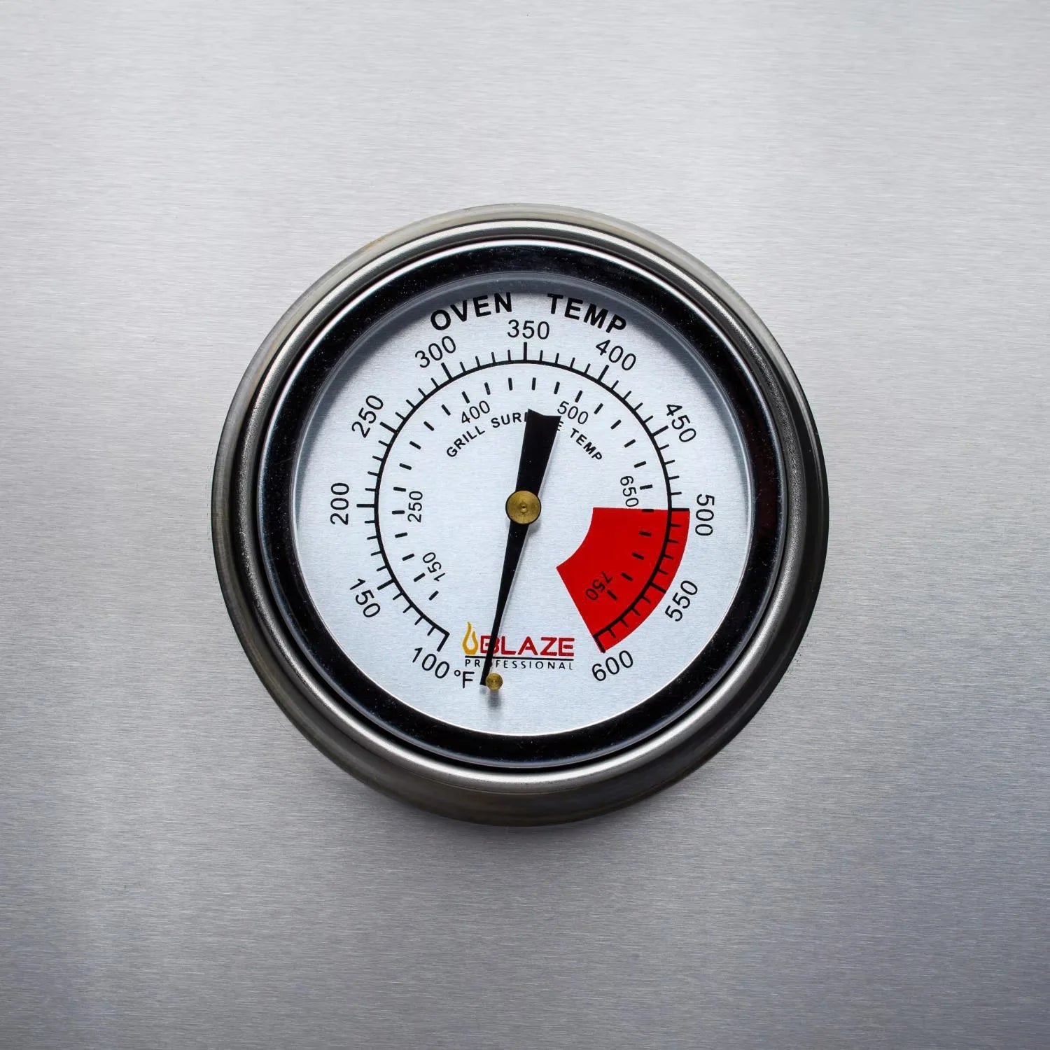 Round oven-style temperature gauge on stainless steel grill lid