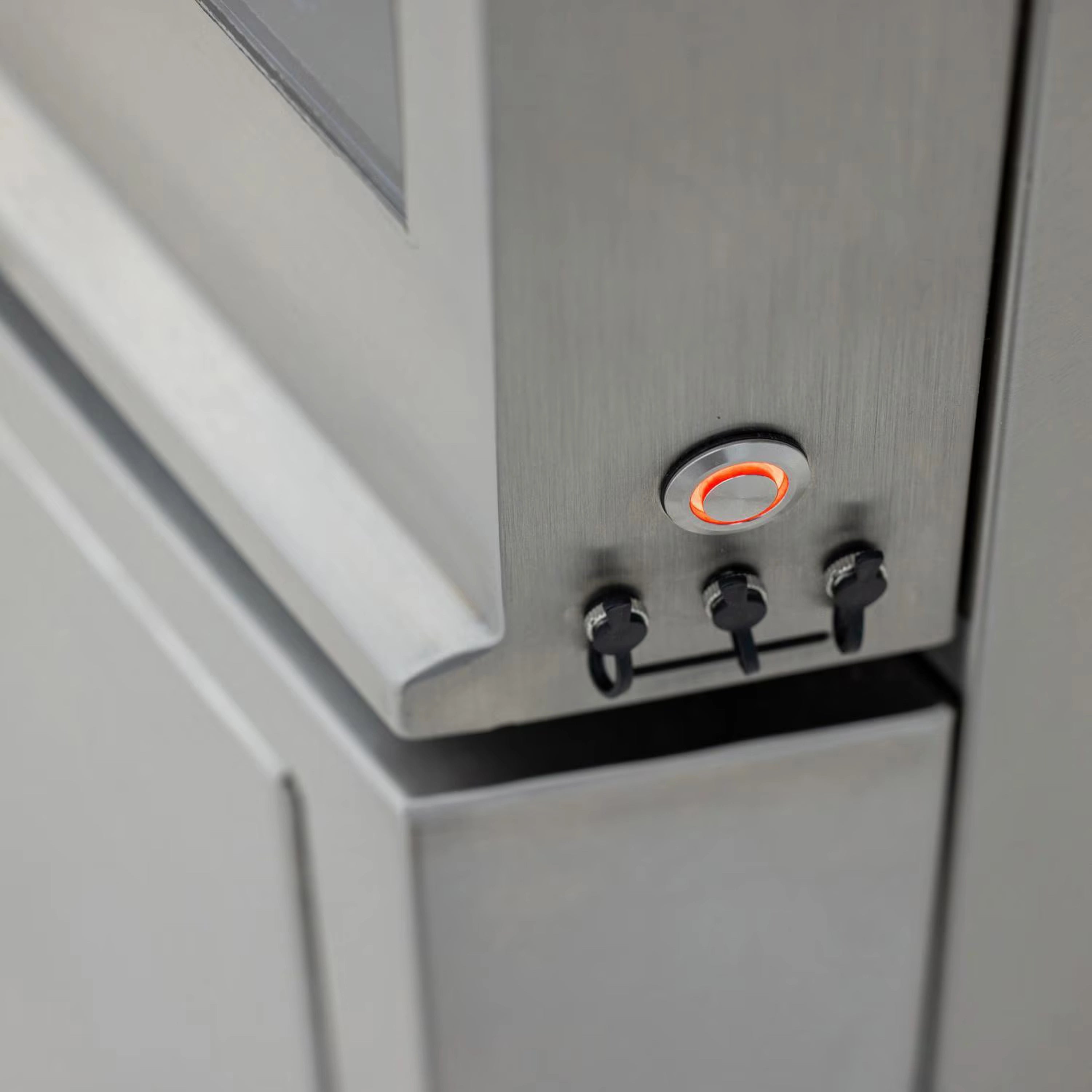 Gas griddle control area with illuminated switch ring and three small knobs