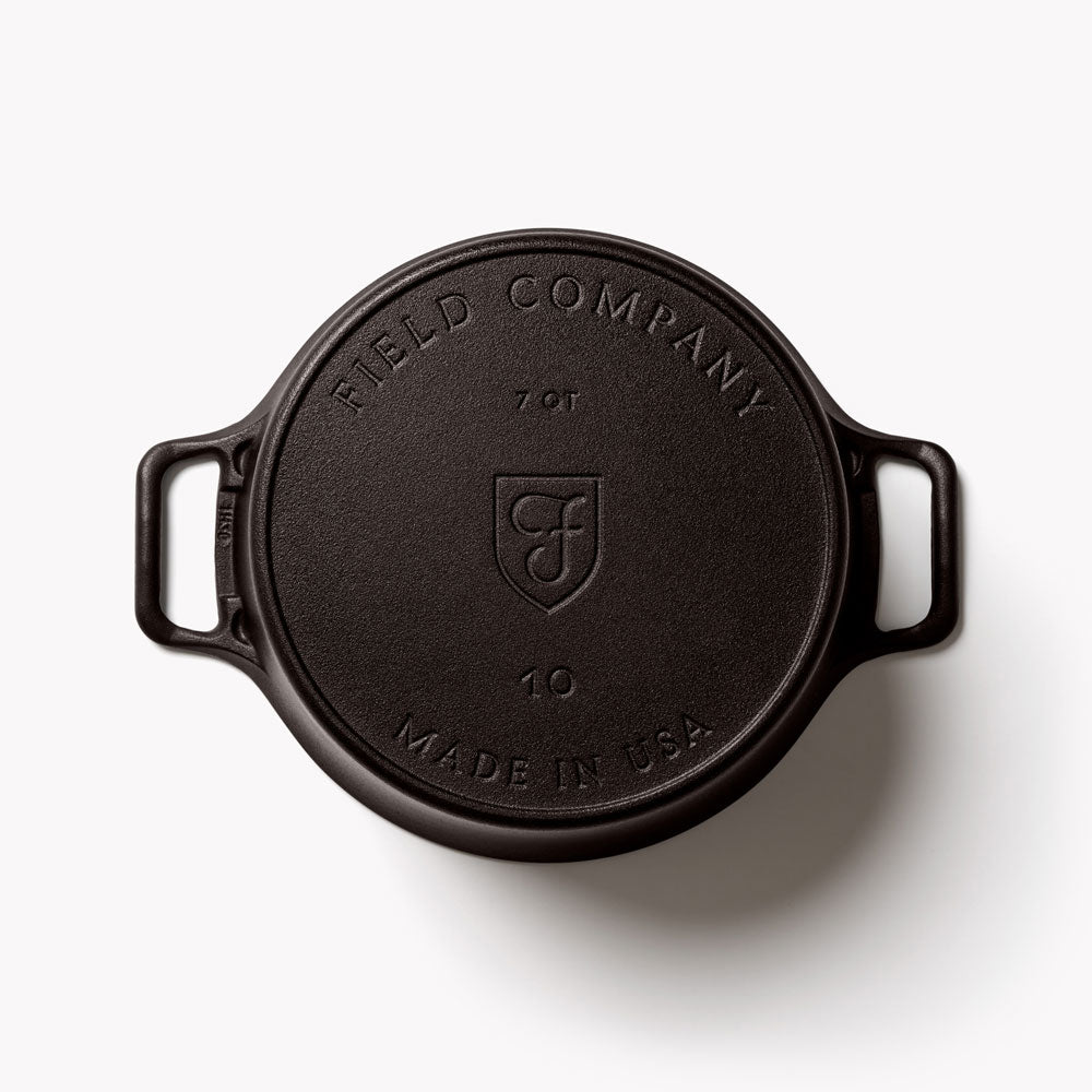 Field Company cast iron Dutch oven base with embossed logo and 'MADE IN USA'