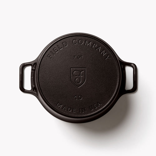 Cast-iron dutch oven base with Field Company logo and "10" marking