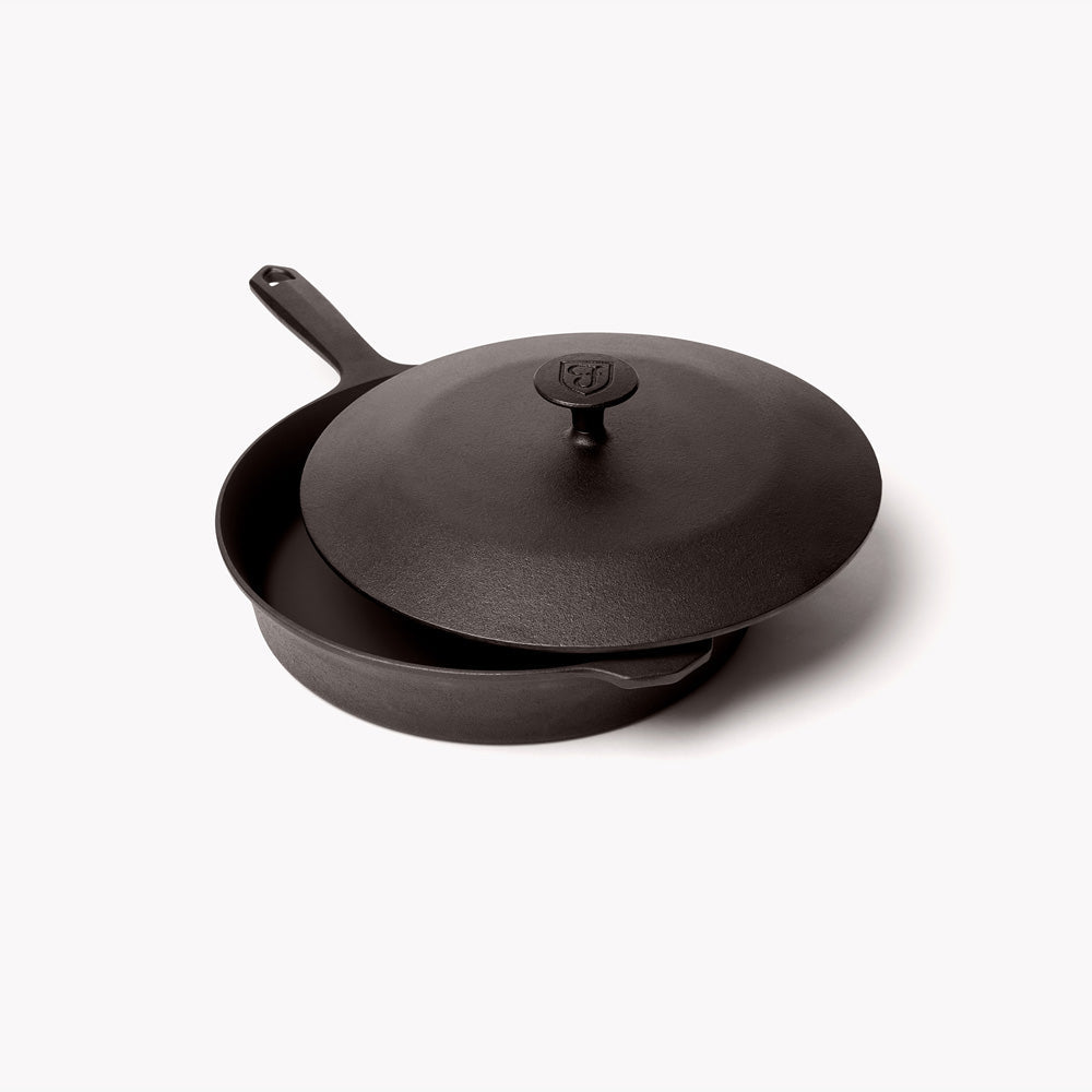 Dark cast-iron skillet with matching lid and side handle, round lid knob