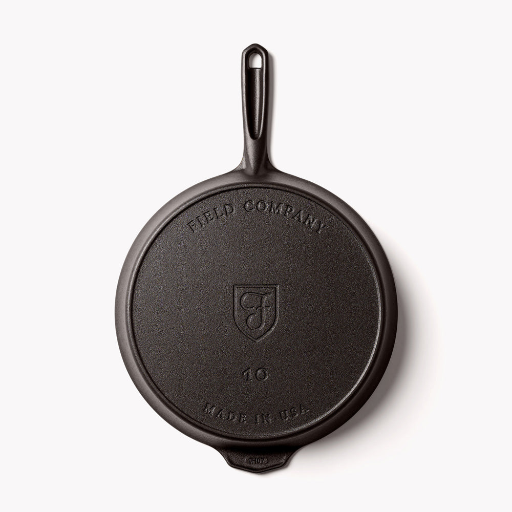 Cast-iron skillet bottom with Field Company logo and size marking 10
