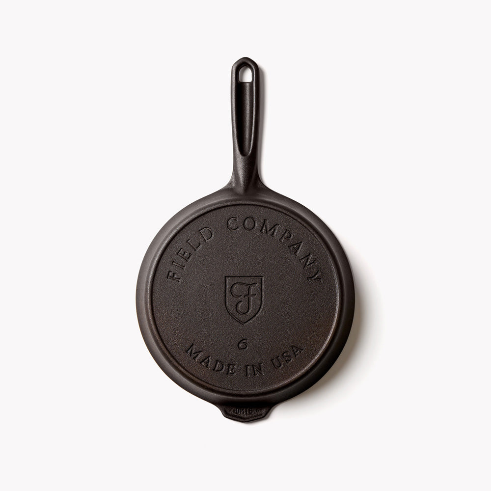 Cast iron skillet base with Field Company logo and Made in USA stamp
