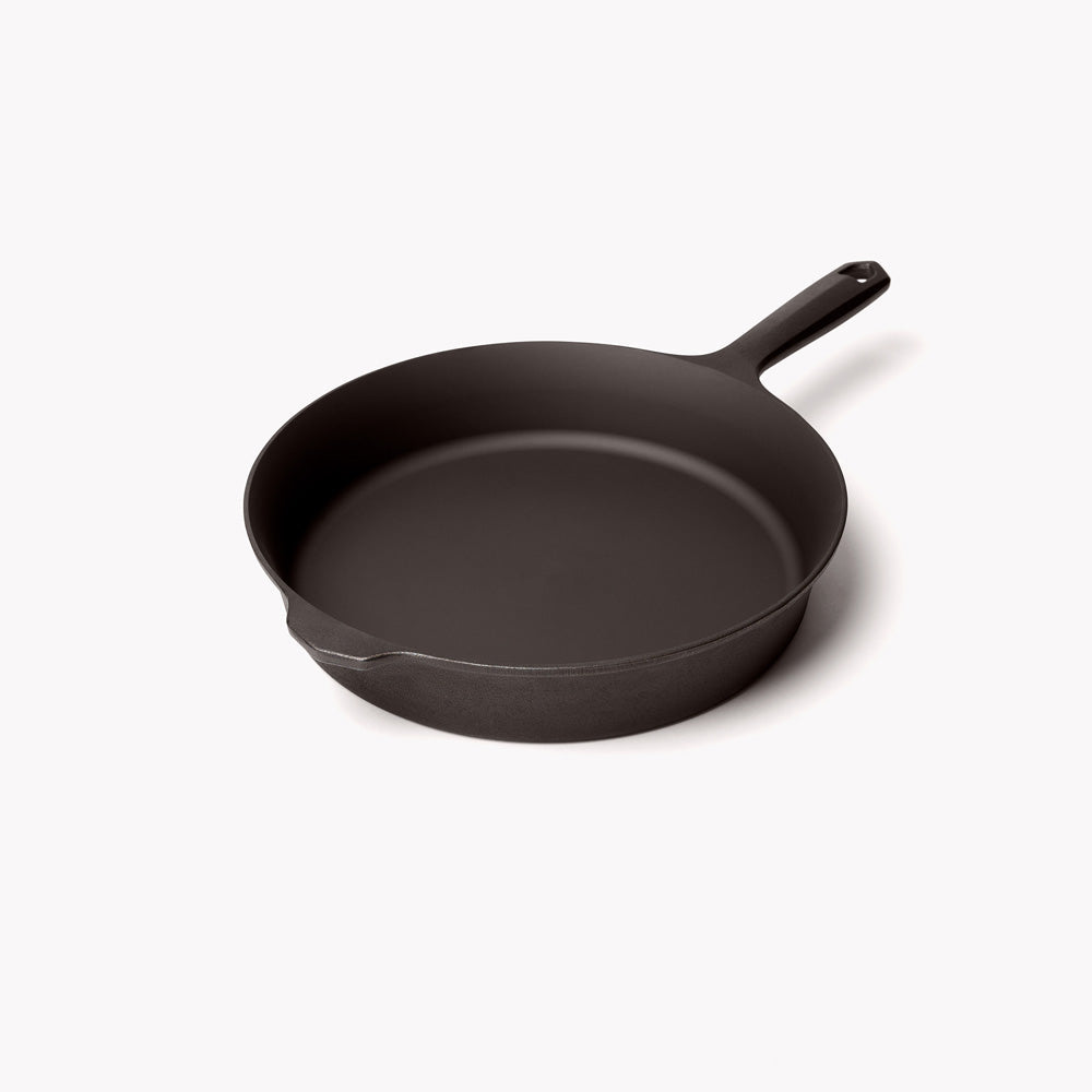 Field Company matte black cast iron skillet with short side spout and handle