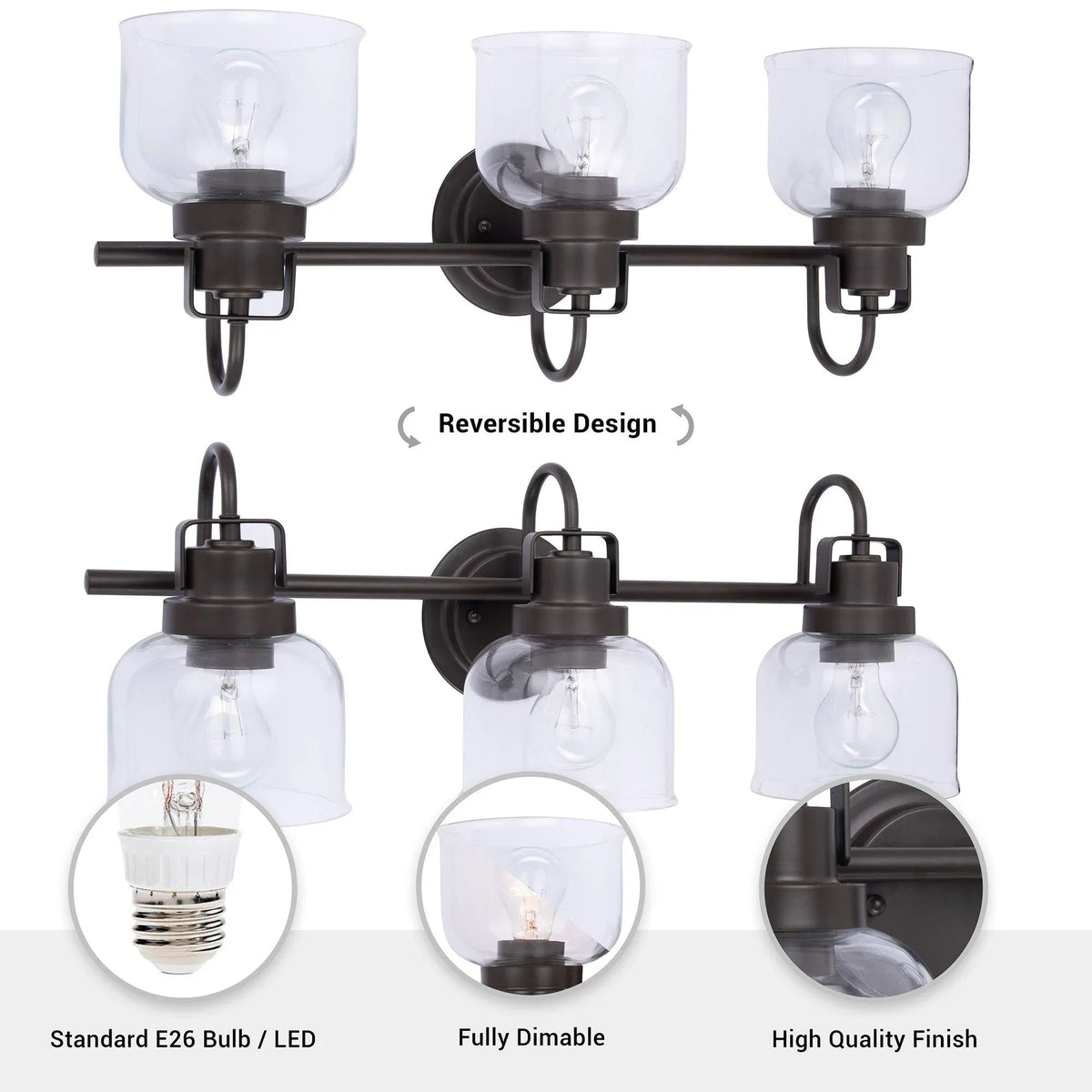 Three-light dark bronze vanity light with clear glass shades and adjustable reversible design