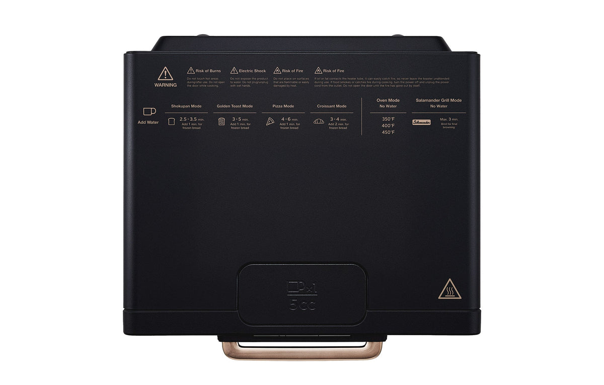 Black countertop toaster oven rear view with safety icons and control area