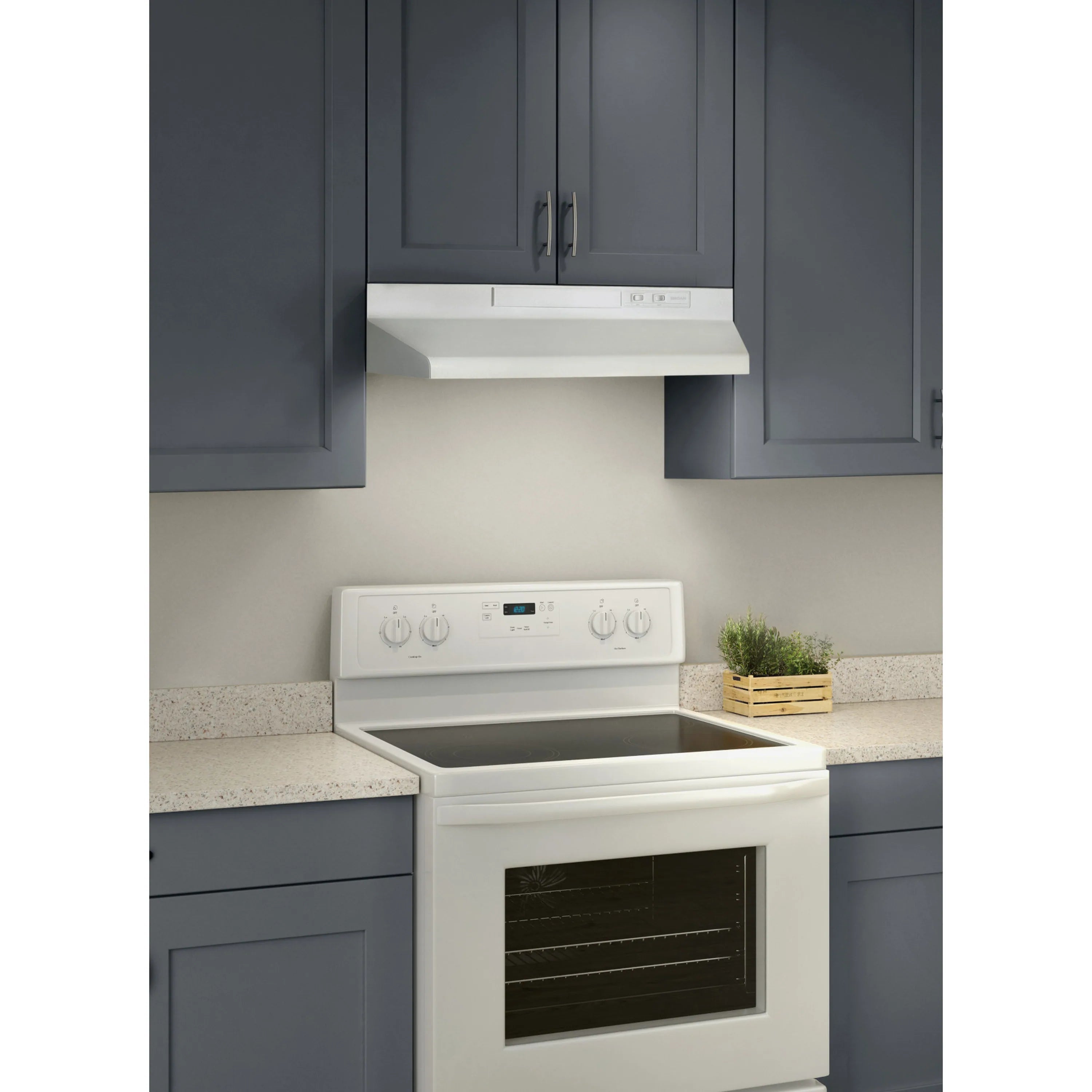 White under-cabinet range hood mounted above cooktop, controls and light bar visible
