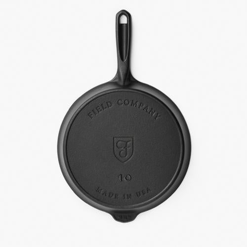 Cast iron skillet underside, embossed shield with No.10 and Made in USA
