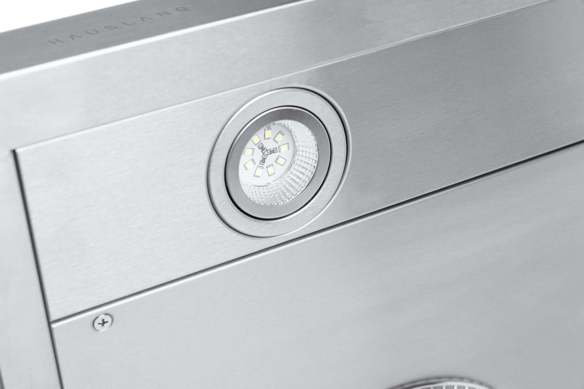 Stainless steel range hood LED light module set into the front panel