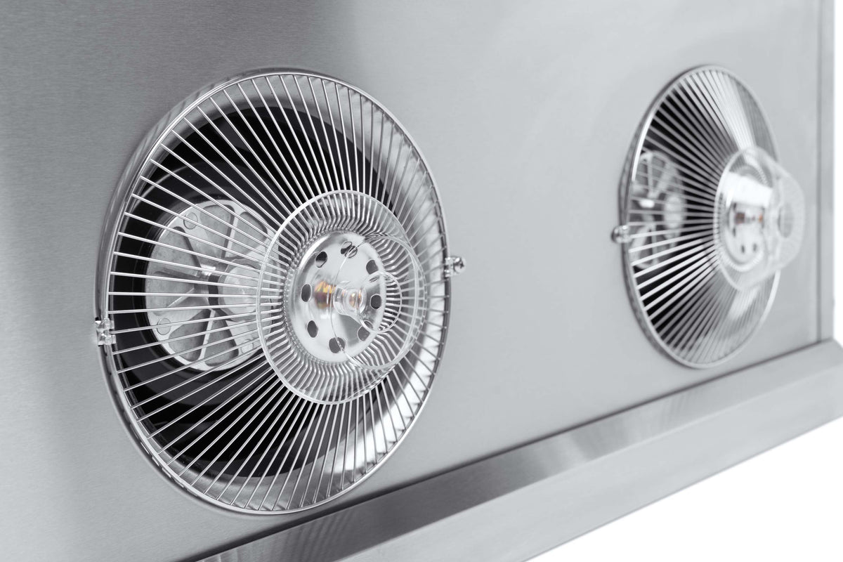 Stainless steel range hood interior showing twin fan grilles and motor detail