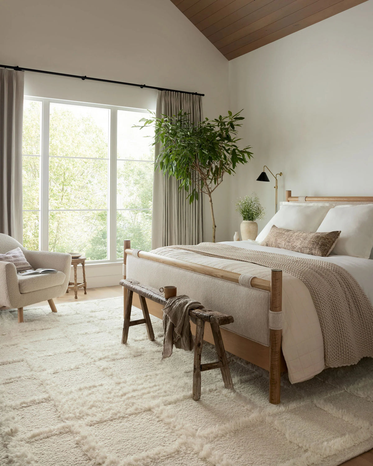Ivory shag area rug with subtle geometric texture across the pile