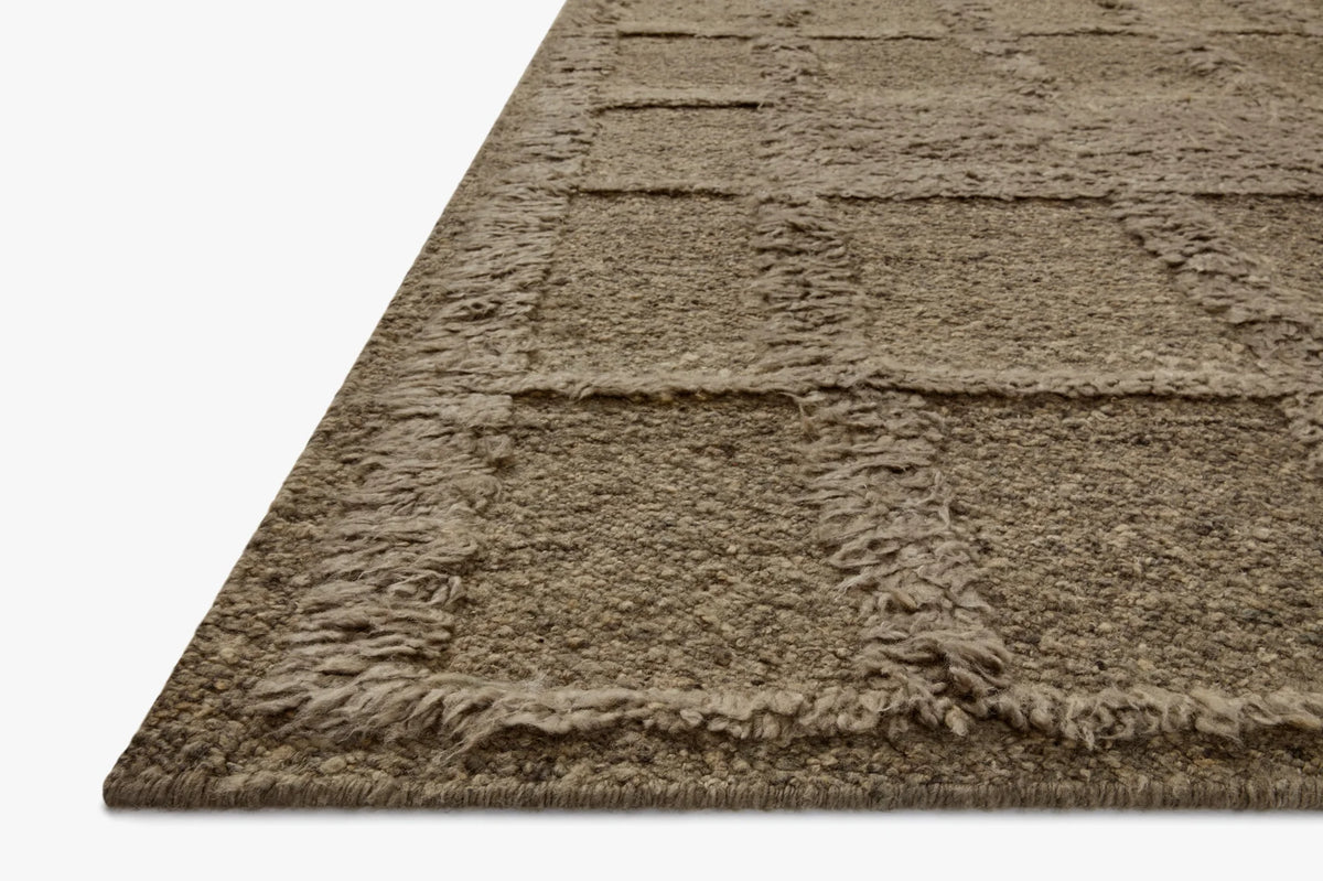 Sage green textured runner rug with fringed edge and looped pile, geometric lines