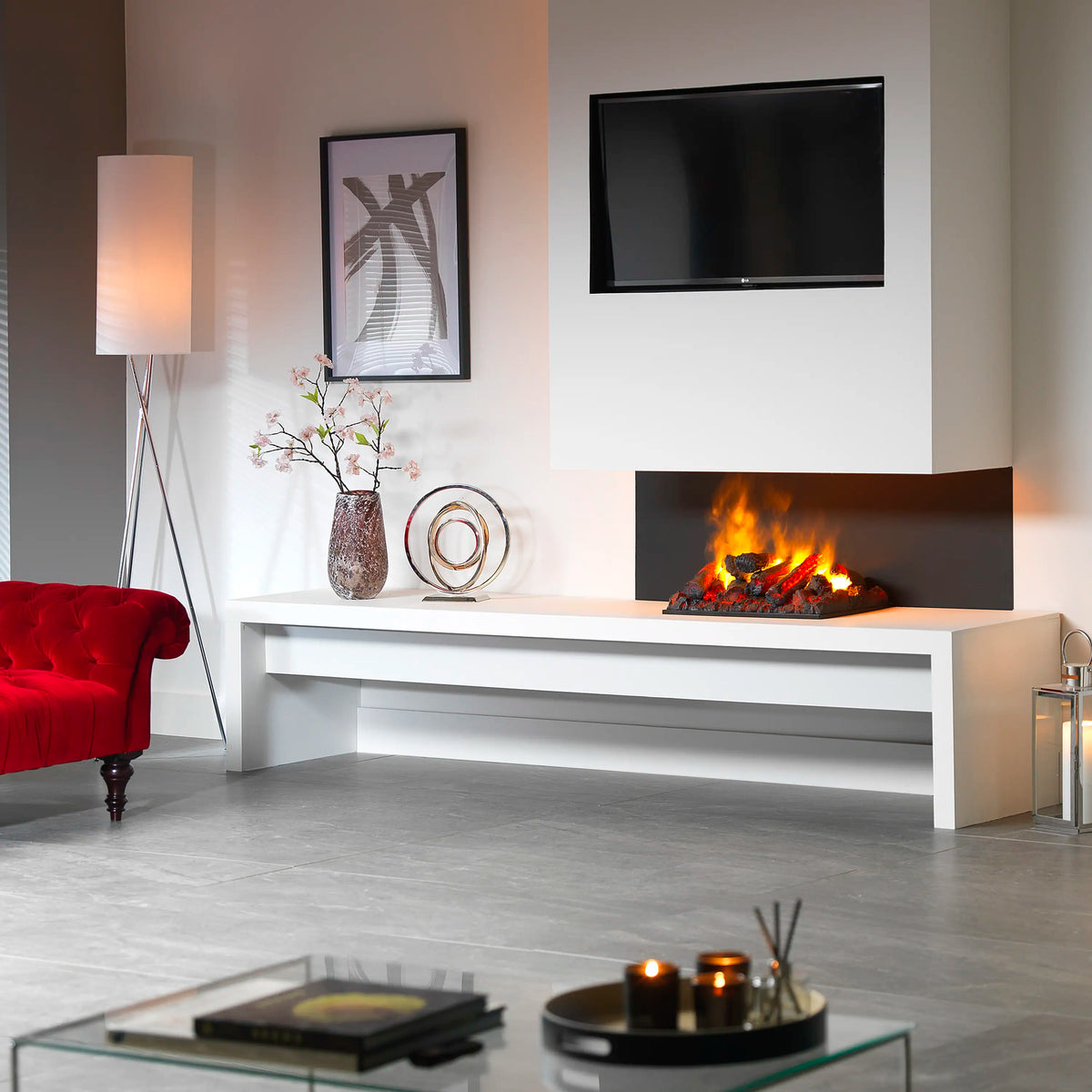 Built-in water vapor firebox with glowing flames inside a white wall niche