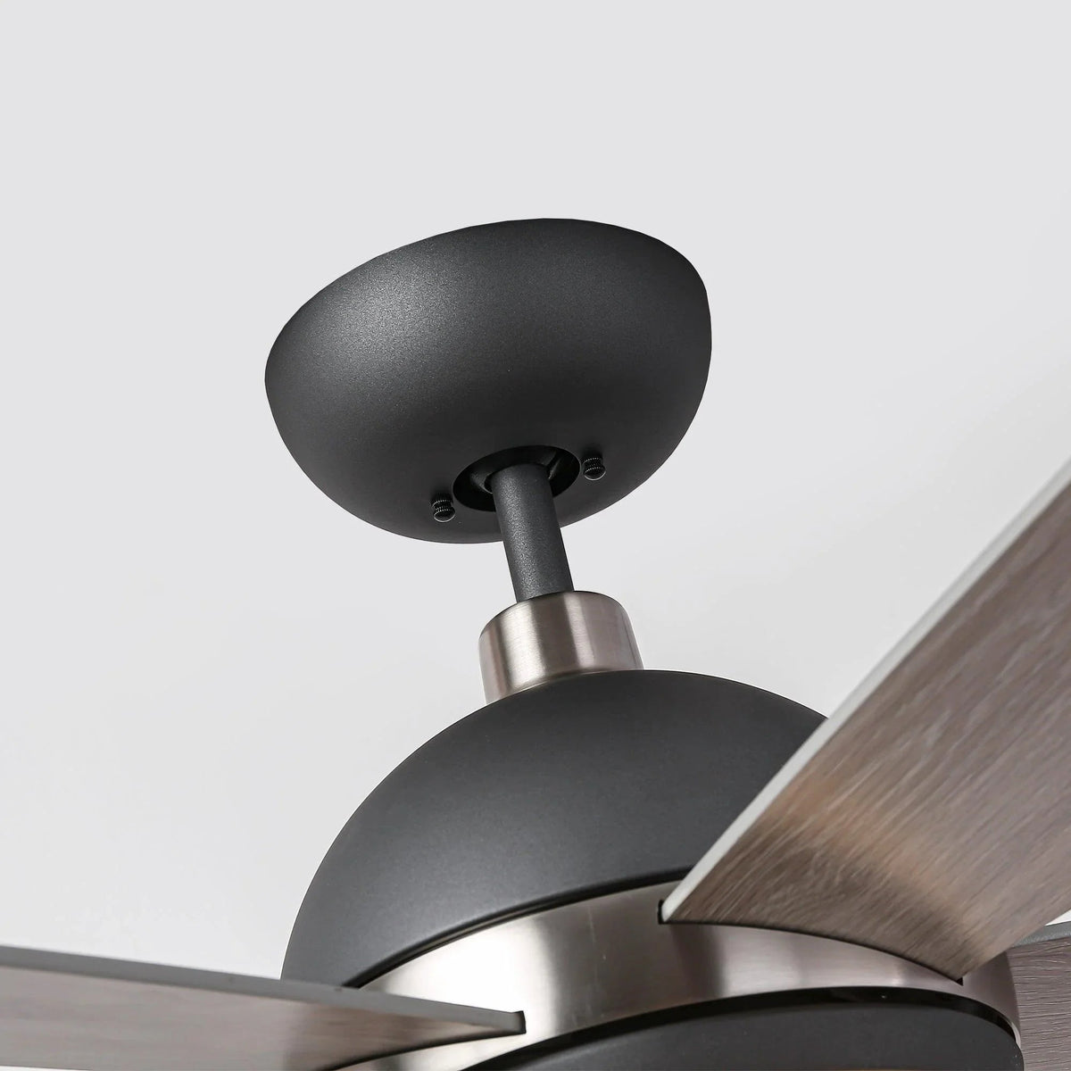 Industrial ceiling fan canopy and motor with black finish and wood-look blade edge