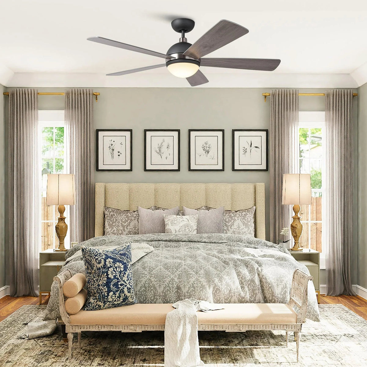 Ceiling fan with five dark gray blades, frosted LED globe, and black motor housing