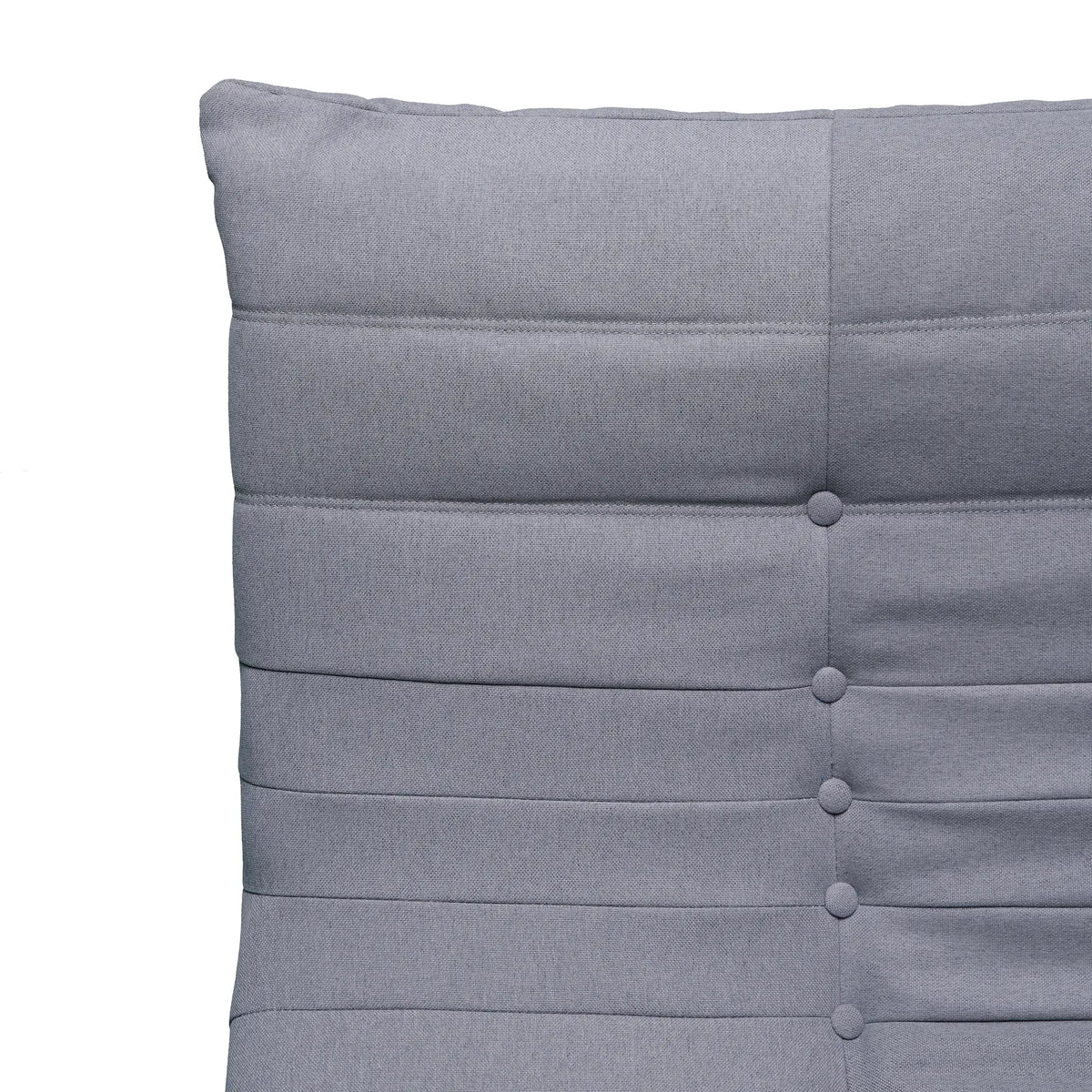 Gray compressed-foam loveseat backrest with vertical button tufting
