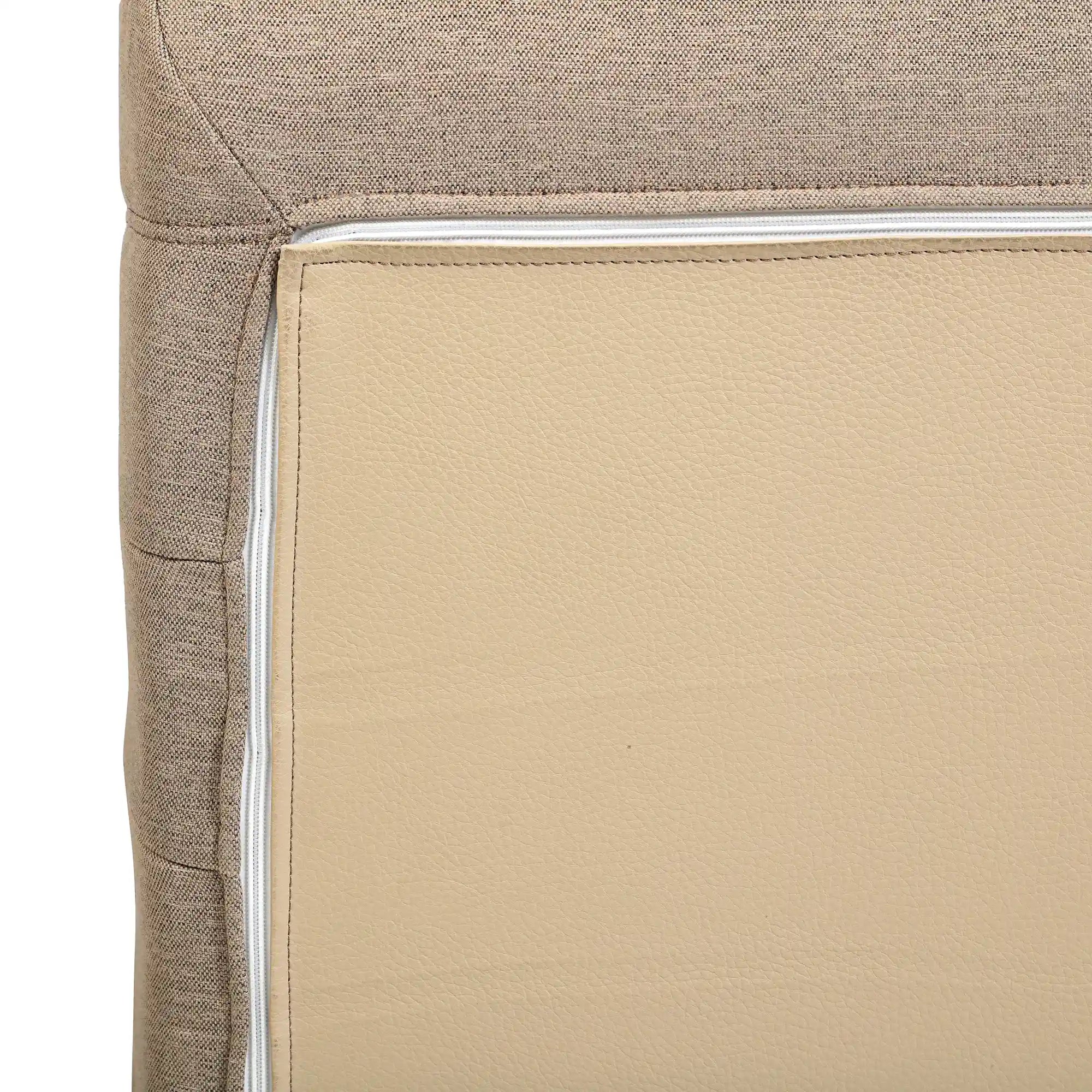Sectional sofa armrest corner close-up in beige fabric with light piping seam