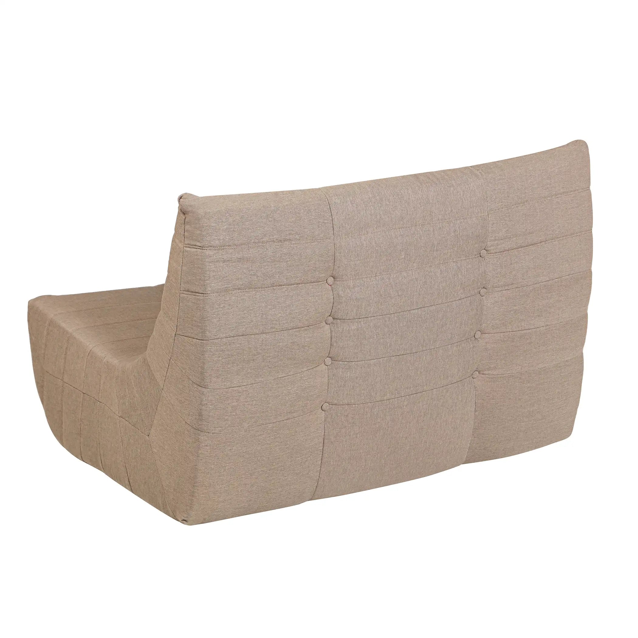 Taupe-brown upholstered armchair with tufted back panels and rounded armrests