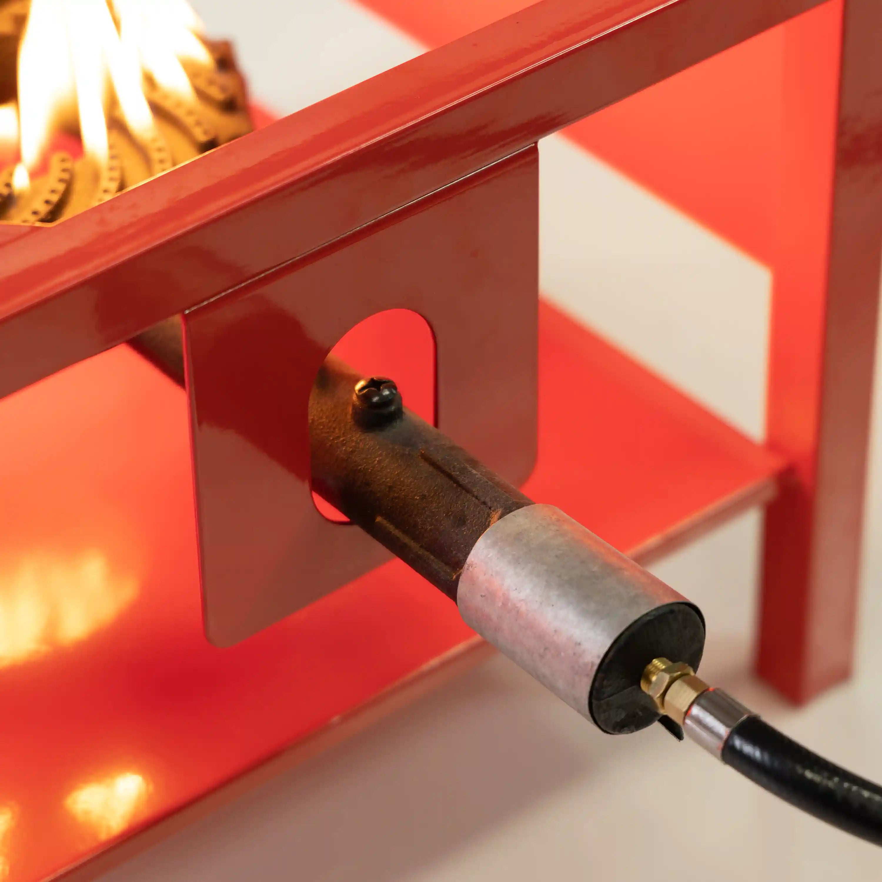 Outdoor propane burner hose connection and control knob mounted under the stand