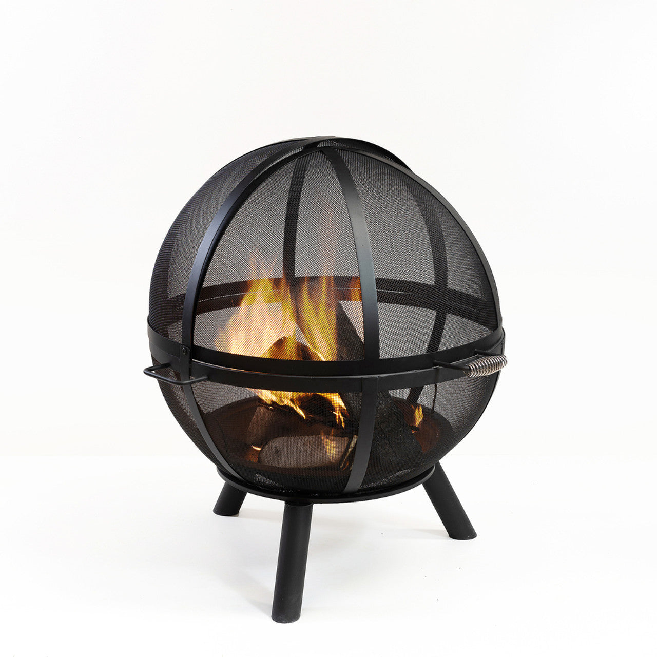 Black mesh dome sphere fire pit with burning wood and front ring guard, three-leg stand