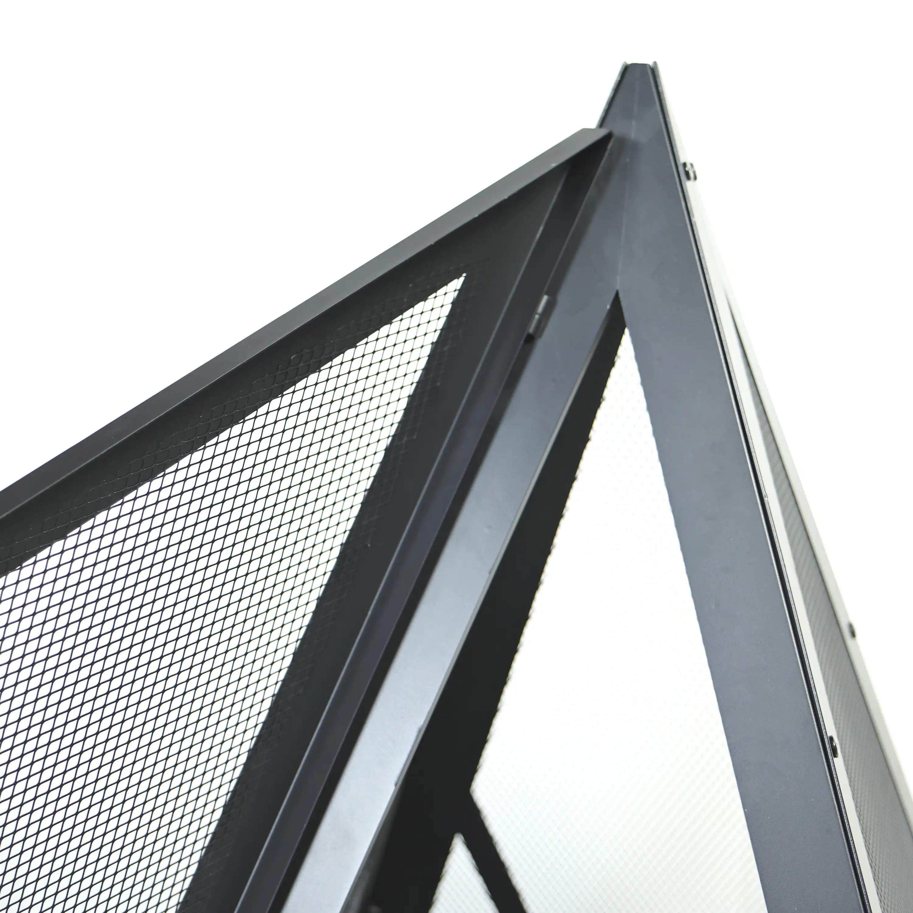 Black steel pyramid fire pit with mesh spark screen and angled top opening