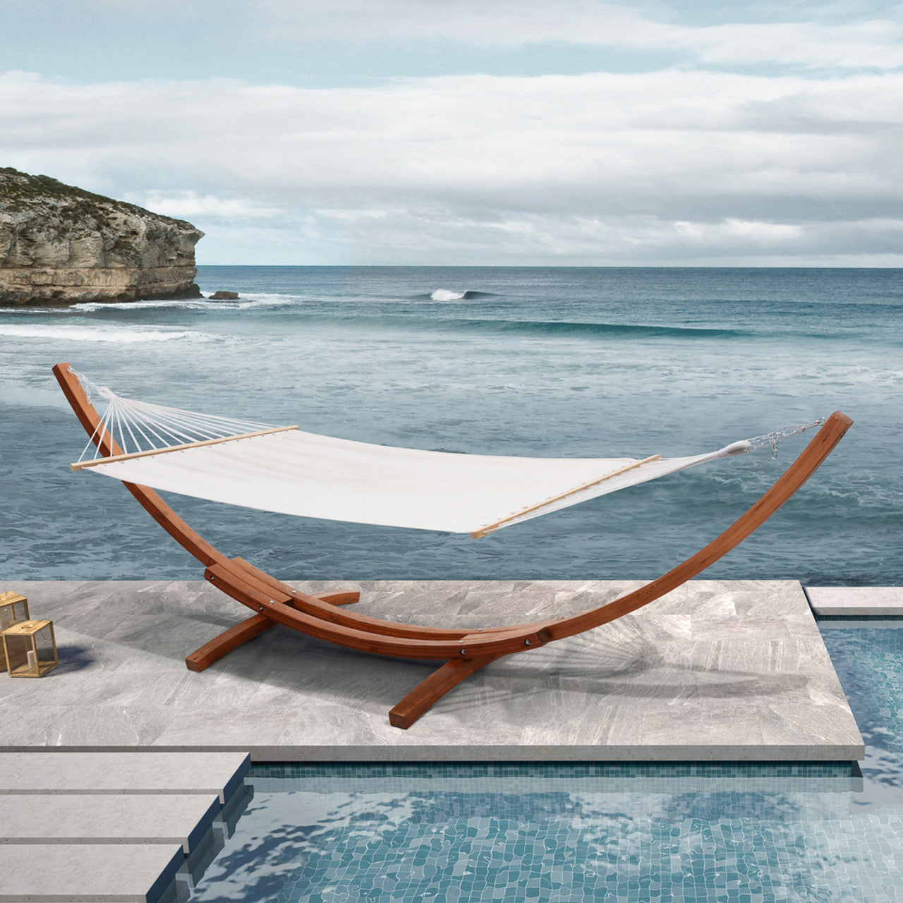 Cedar wood hammock with white fabric sling and rope netting, side view