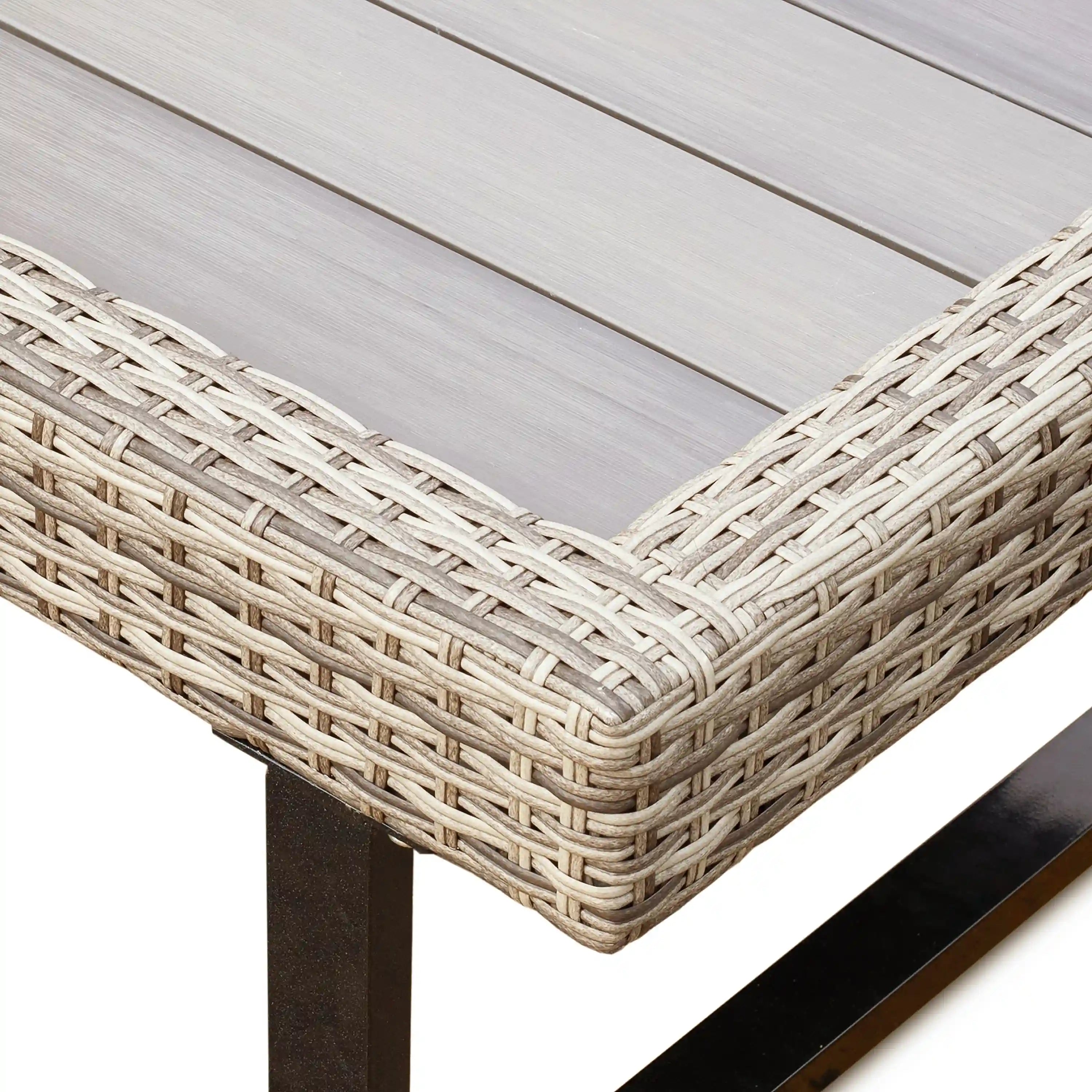 Woven wicker corner trim detail on outdoor patio table top
