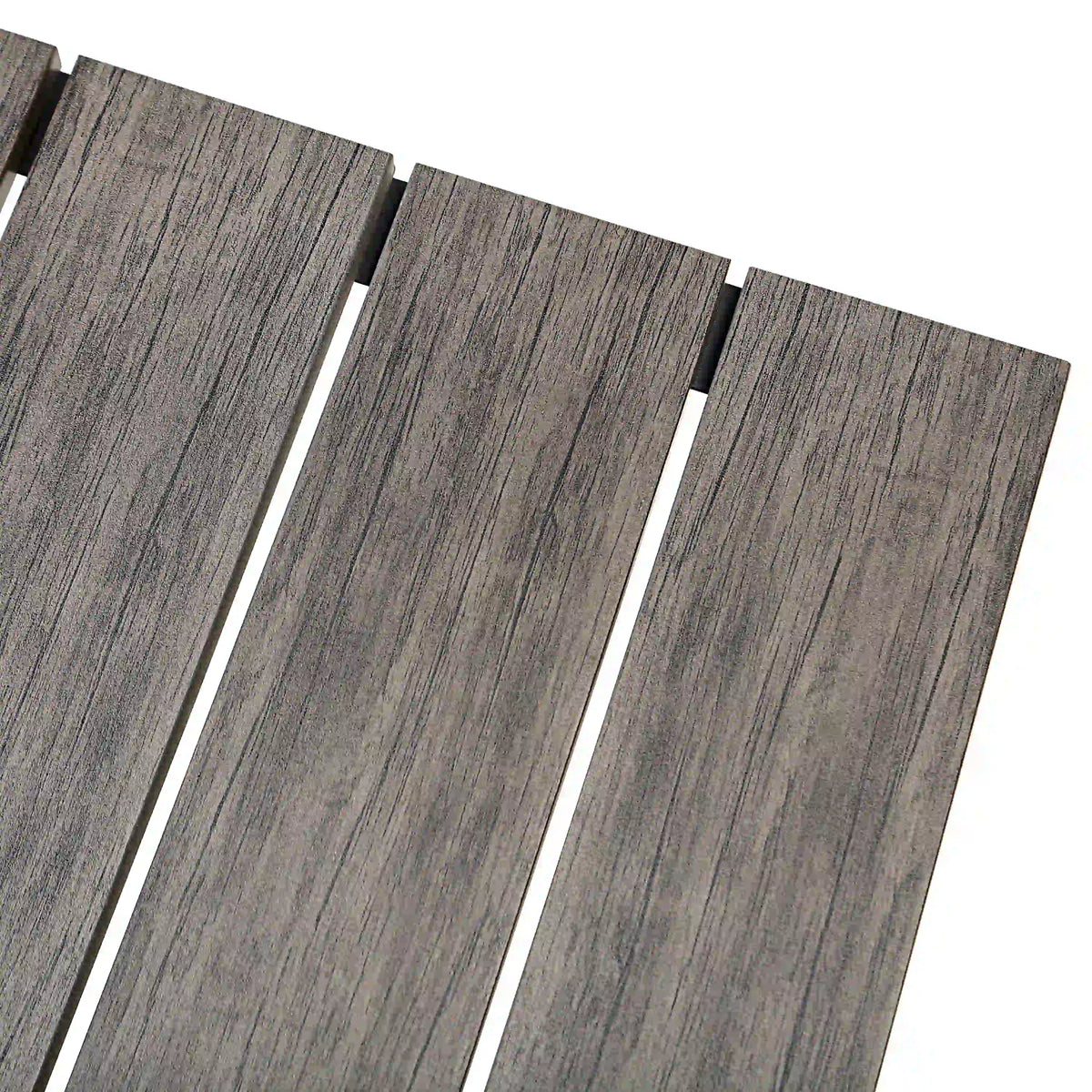 Close-up of gray slat tabletop on outdoor ottoman table with black supports