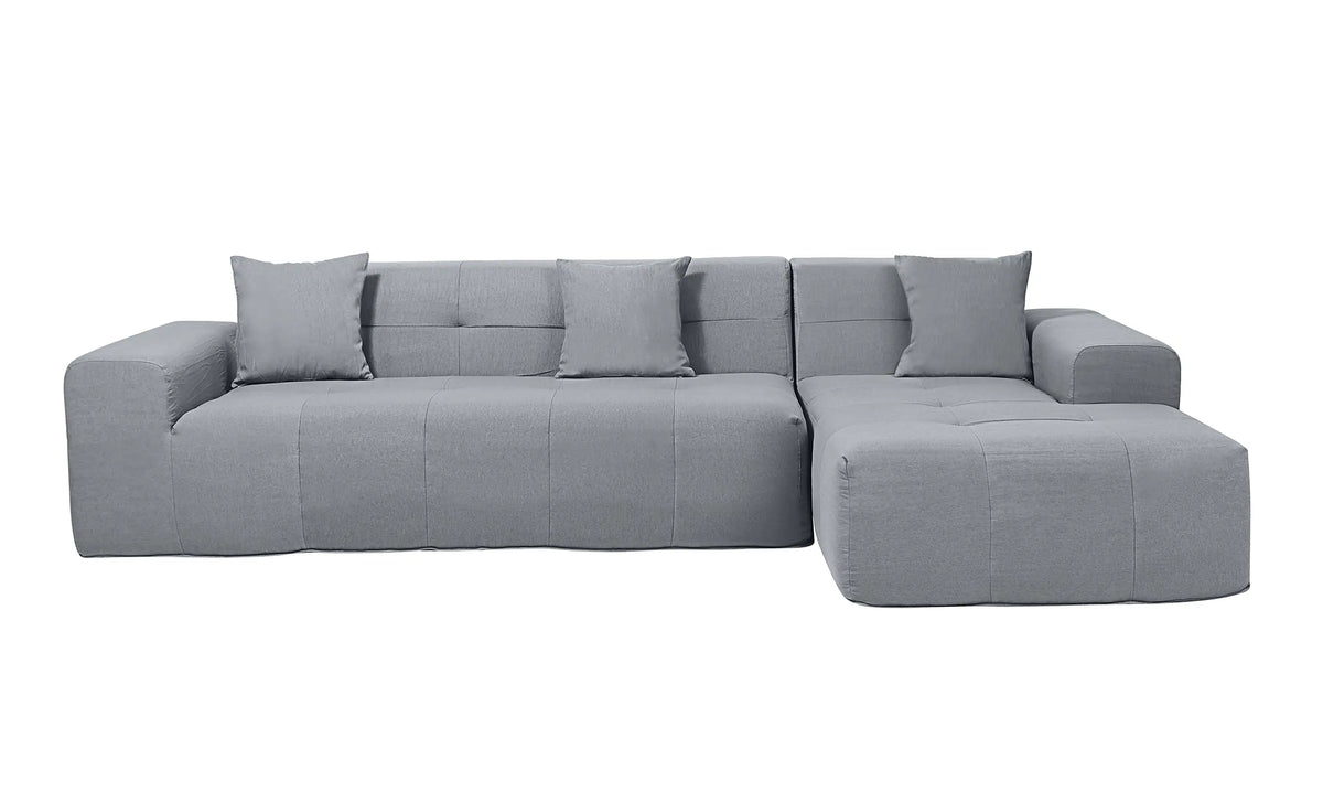 Gray outdoor modular sectional sofa with five back cushions and chaise ottoman