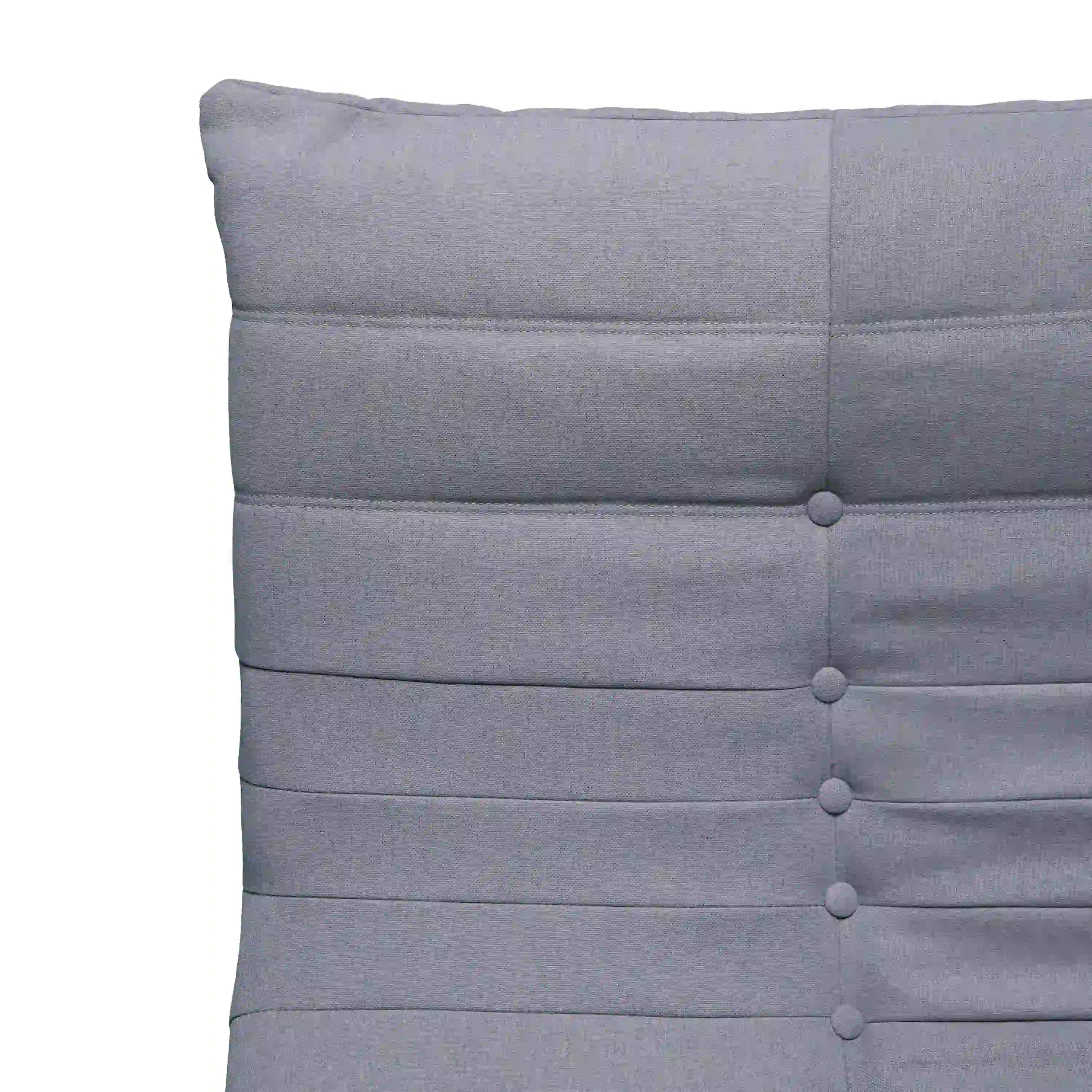 Gray upholstered loveseat chair back with horizontal channels and round button tufting