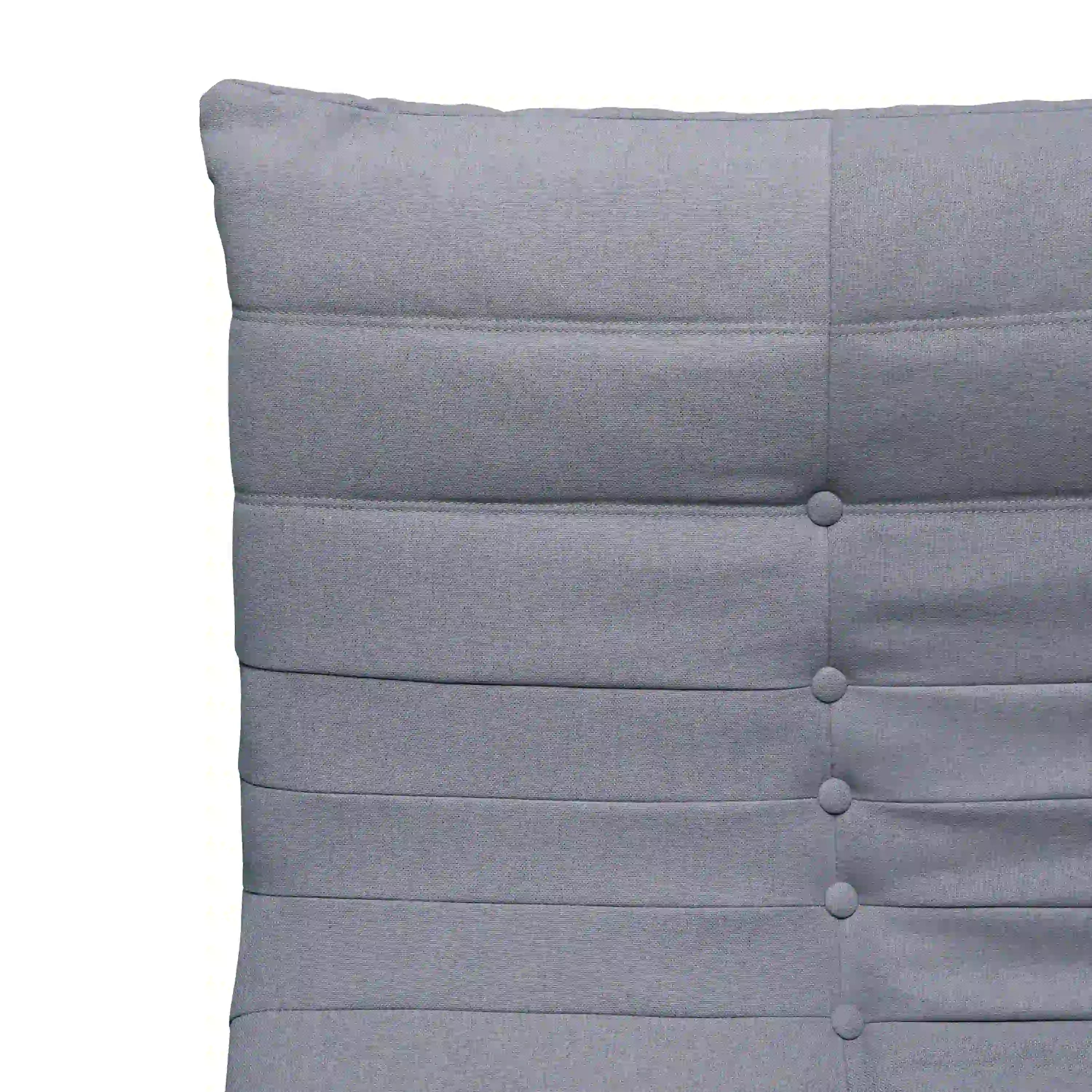 Gray chair back panel close-up with horizontal stitching and round button details